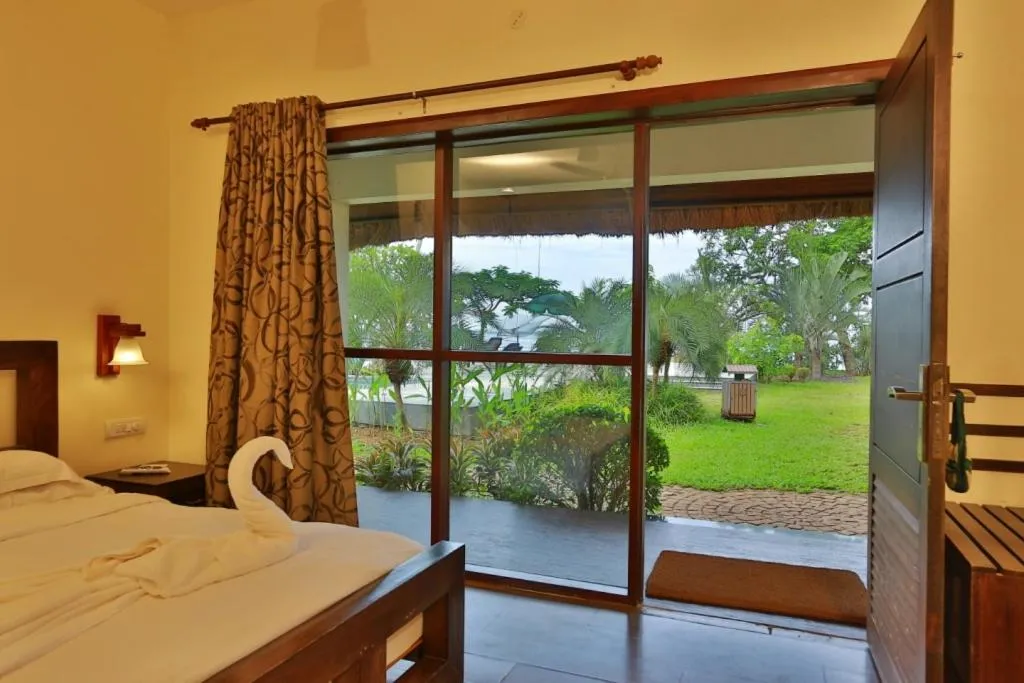 Bed in Deshadan Backwater Resort - The best sunrise view