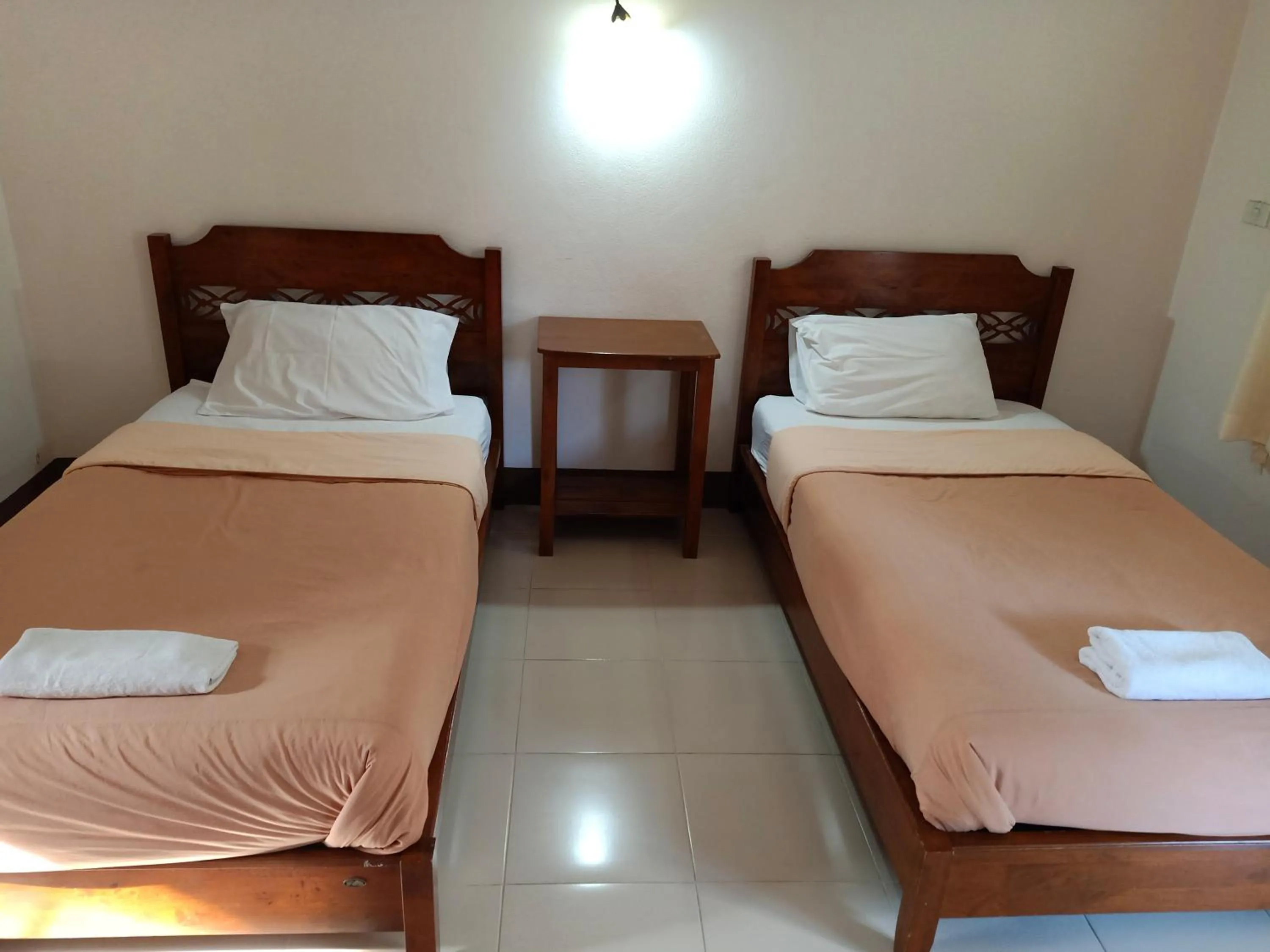 Bed in Phumchan Place Hotel