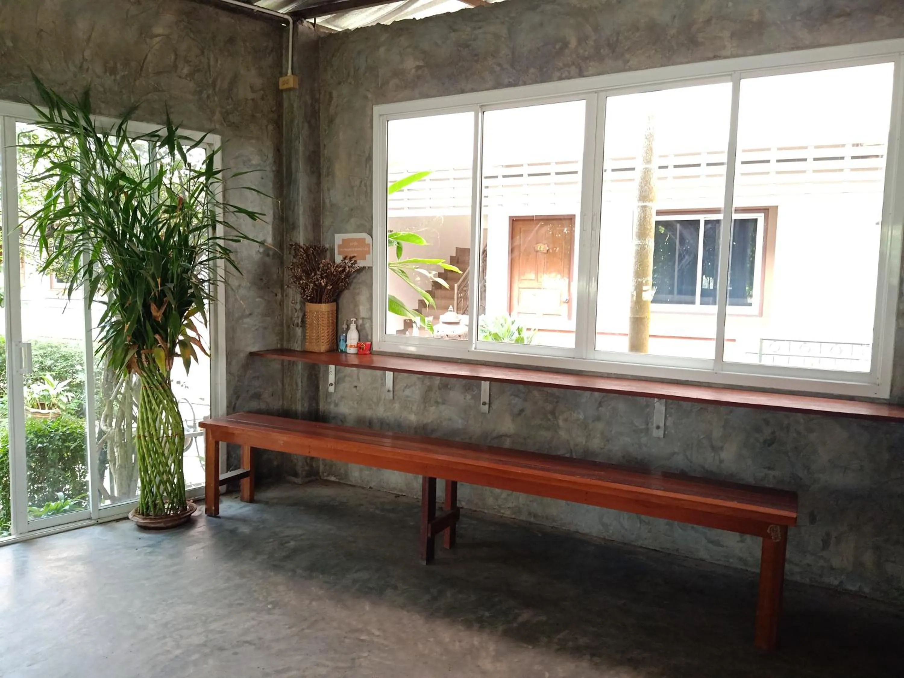 Seating area in Phumchan Place Hotel