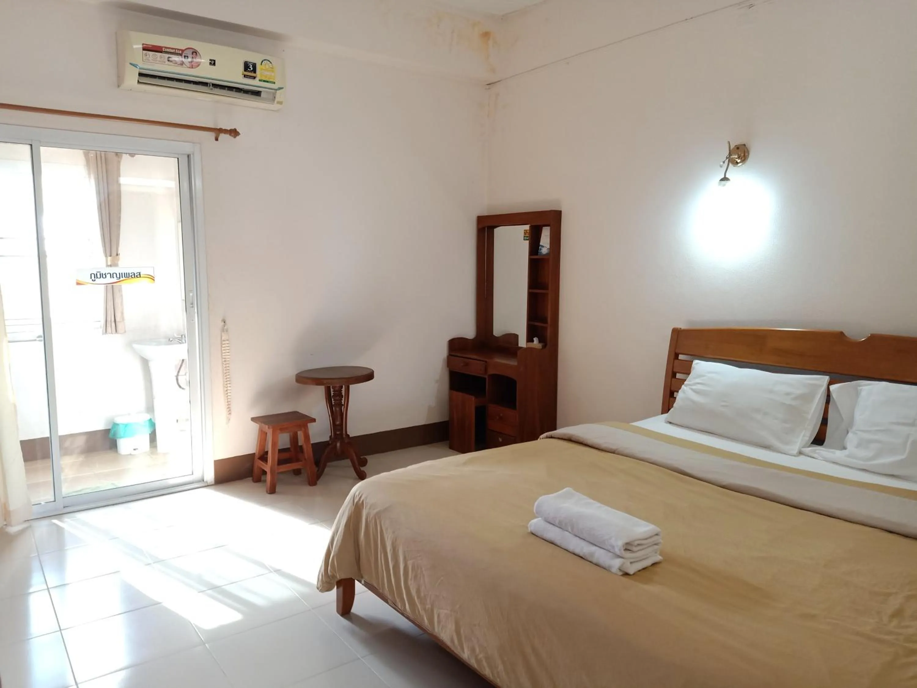 Bed in Phumchan Place Hotel