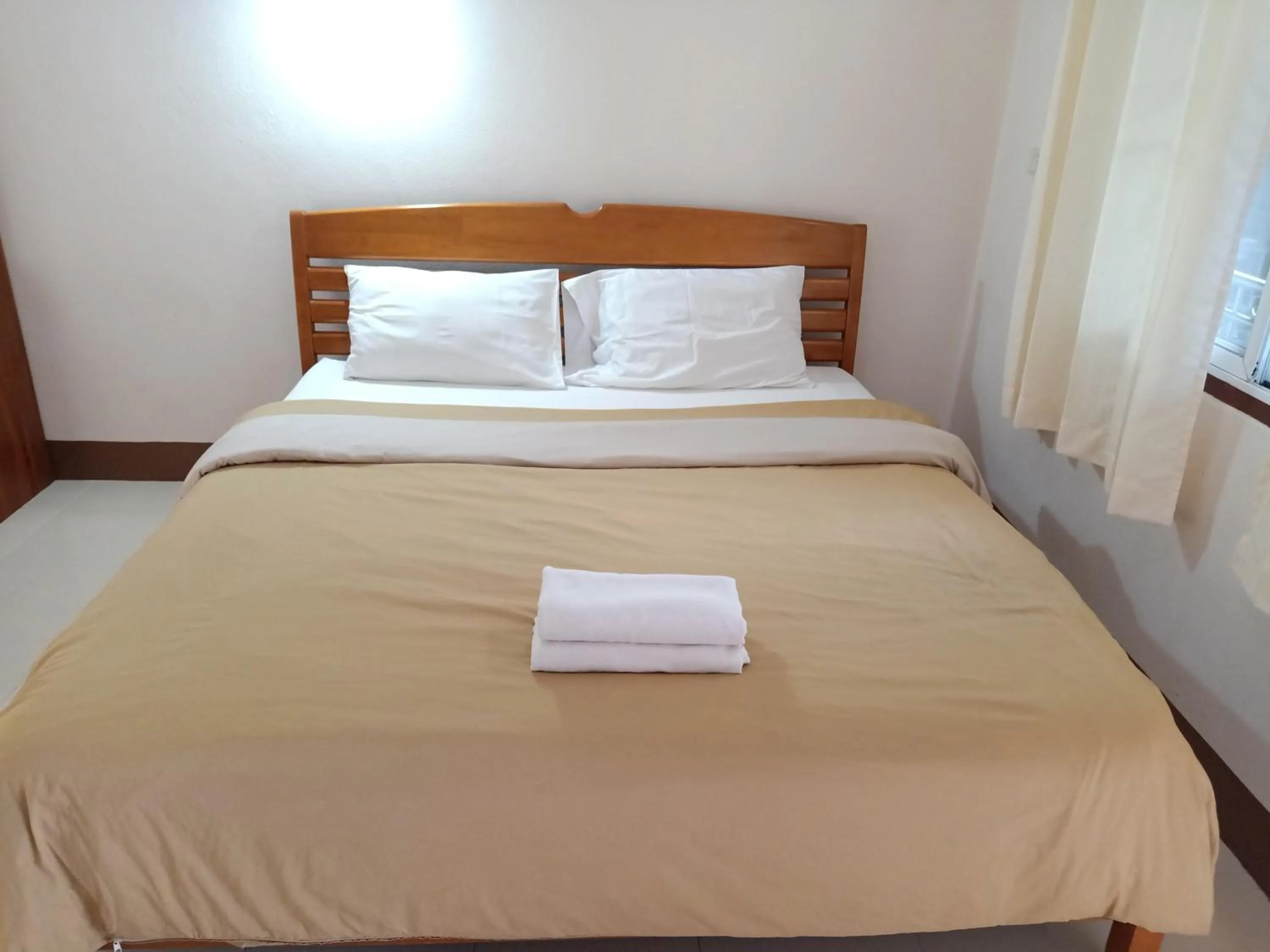 Bed in Phumchan Place Hotel