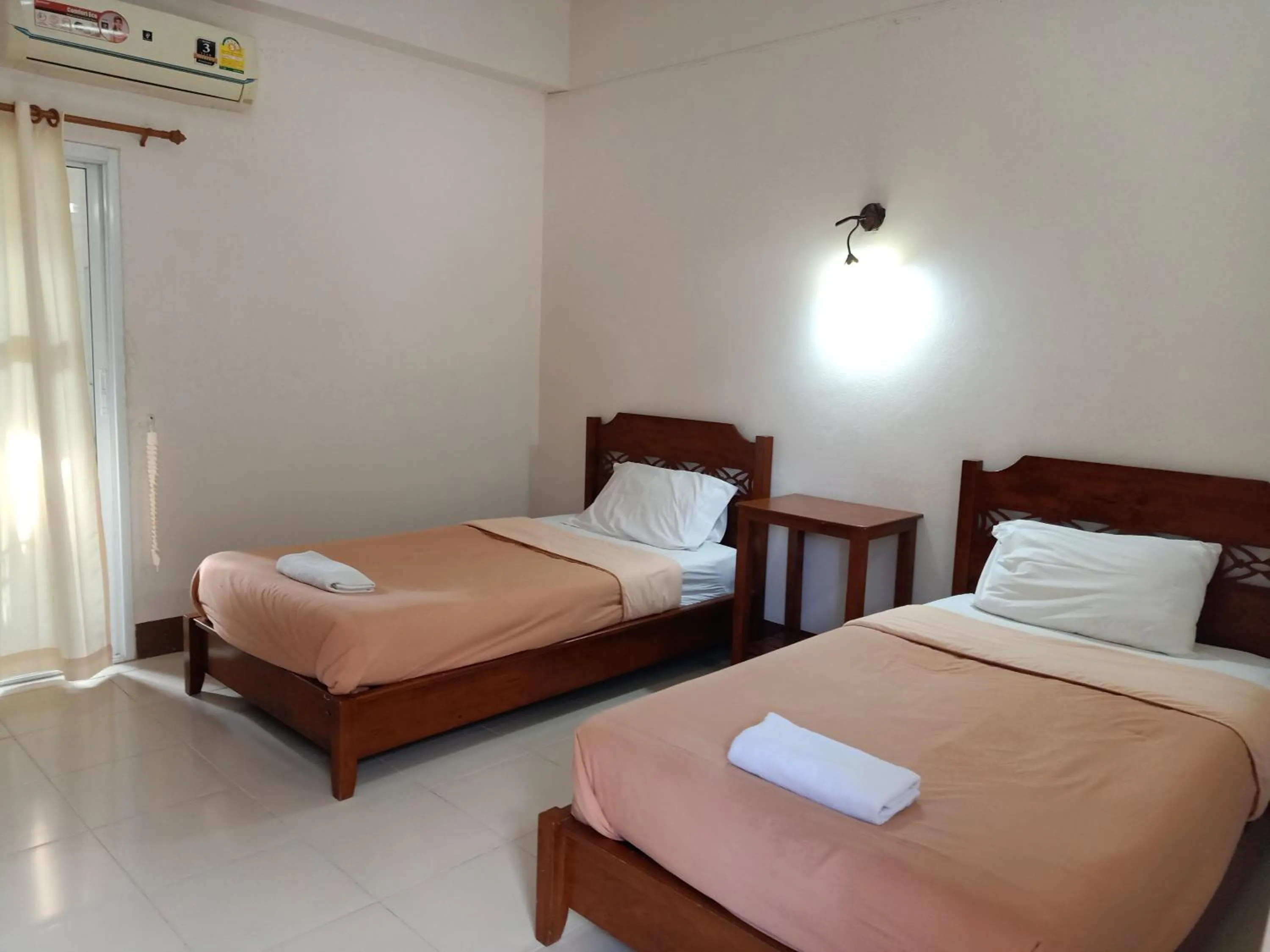 Bed in Phumchan Place Hotel