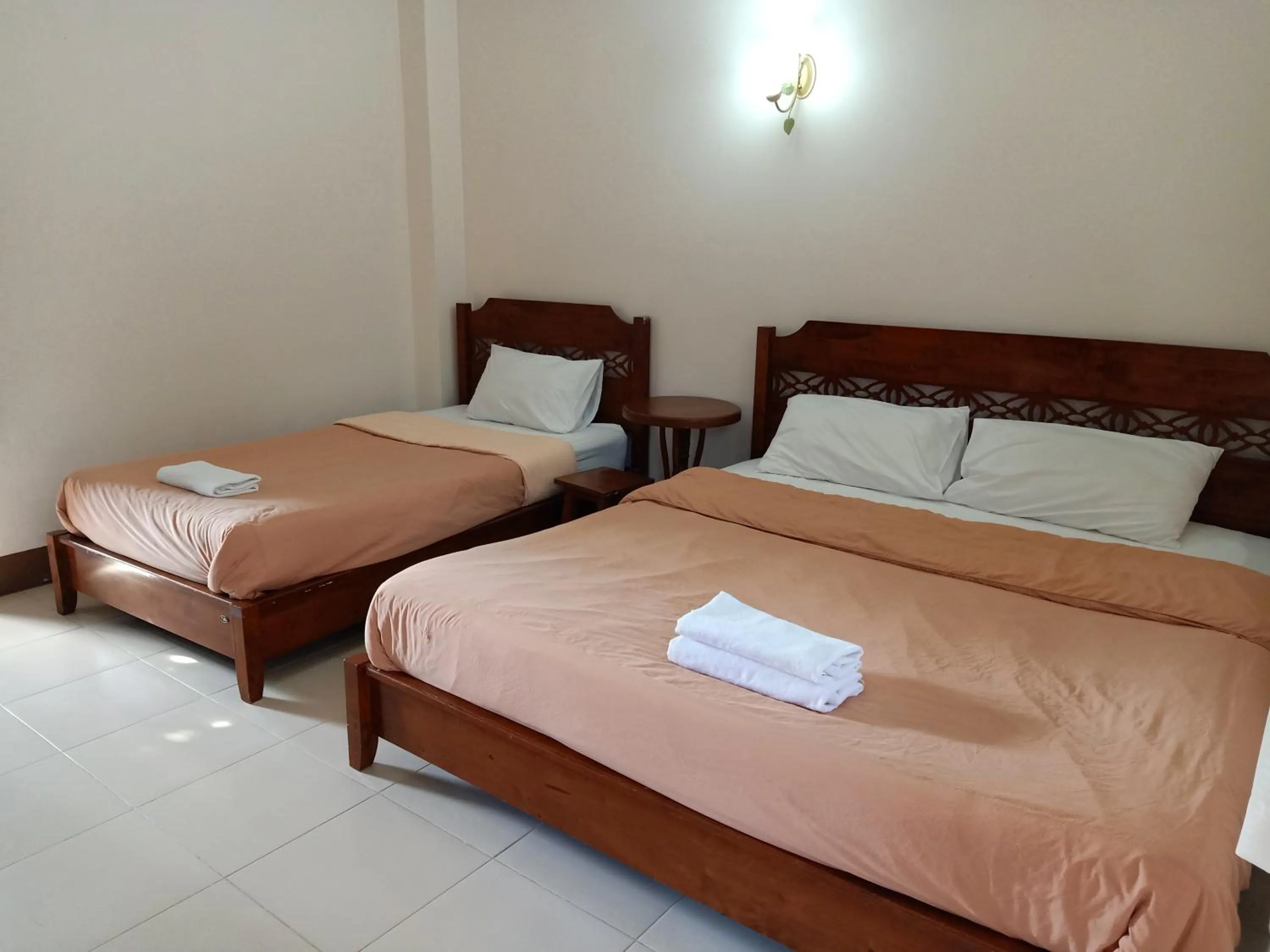 Bed in Phumchan Place Hotel