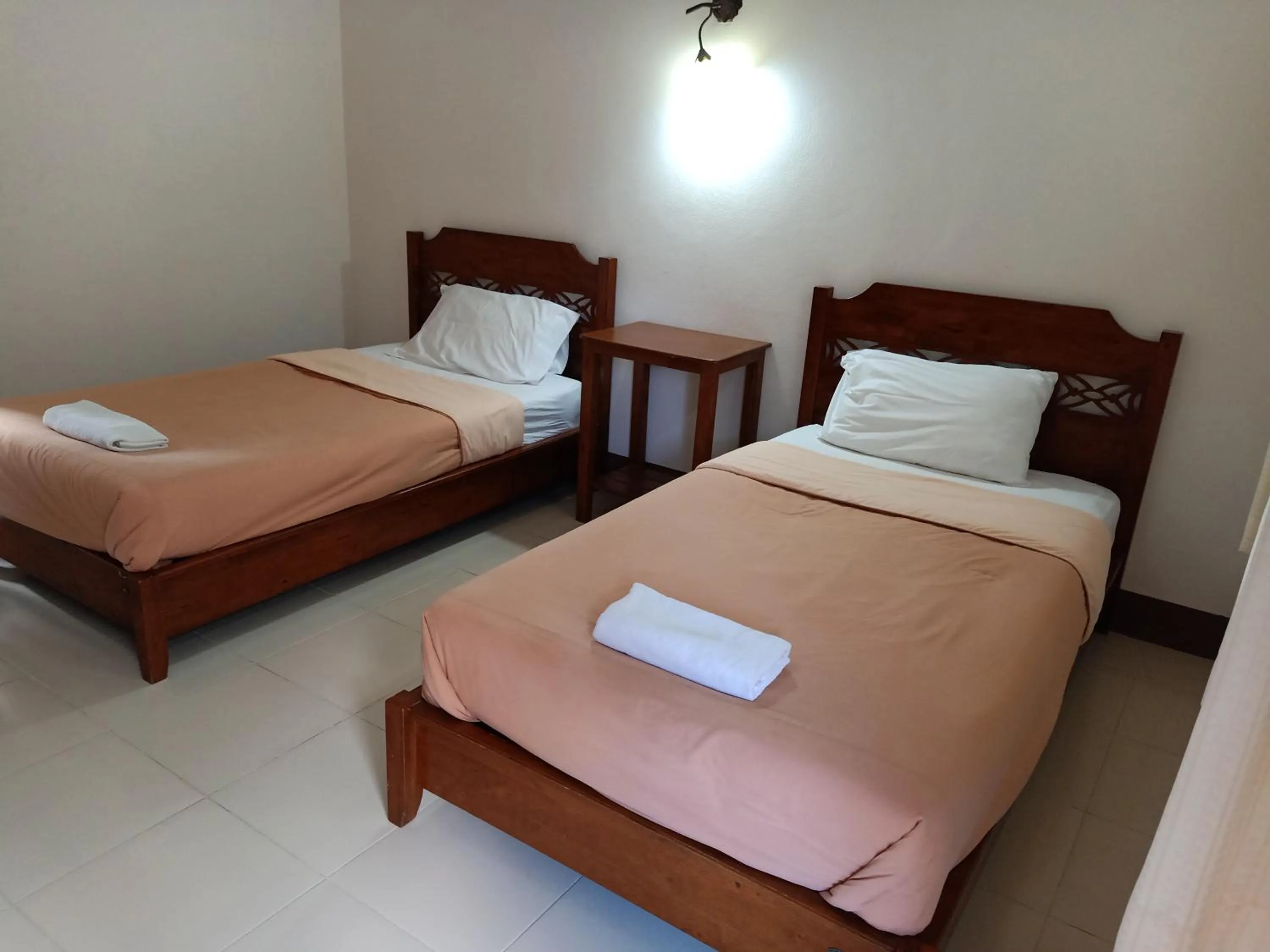 Bed in Phumchan Place Hotel