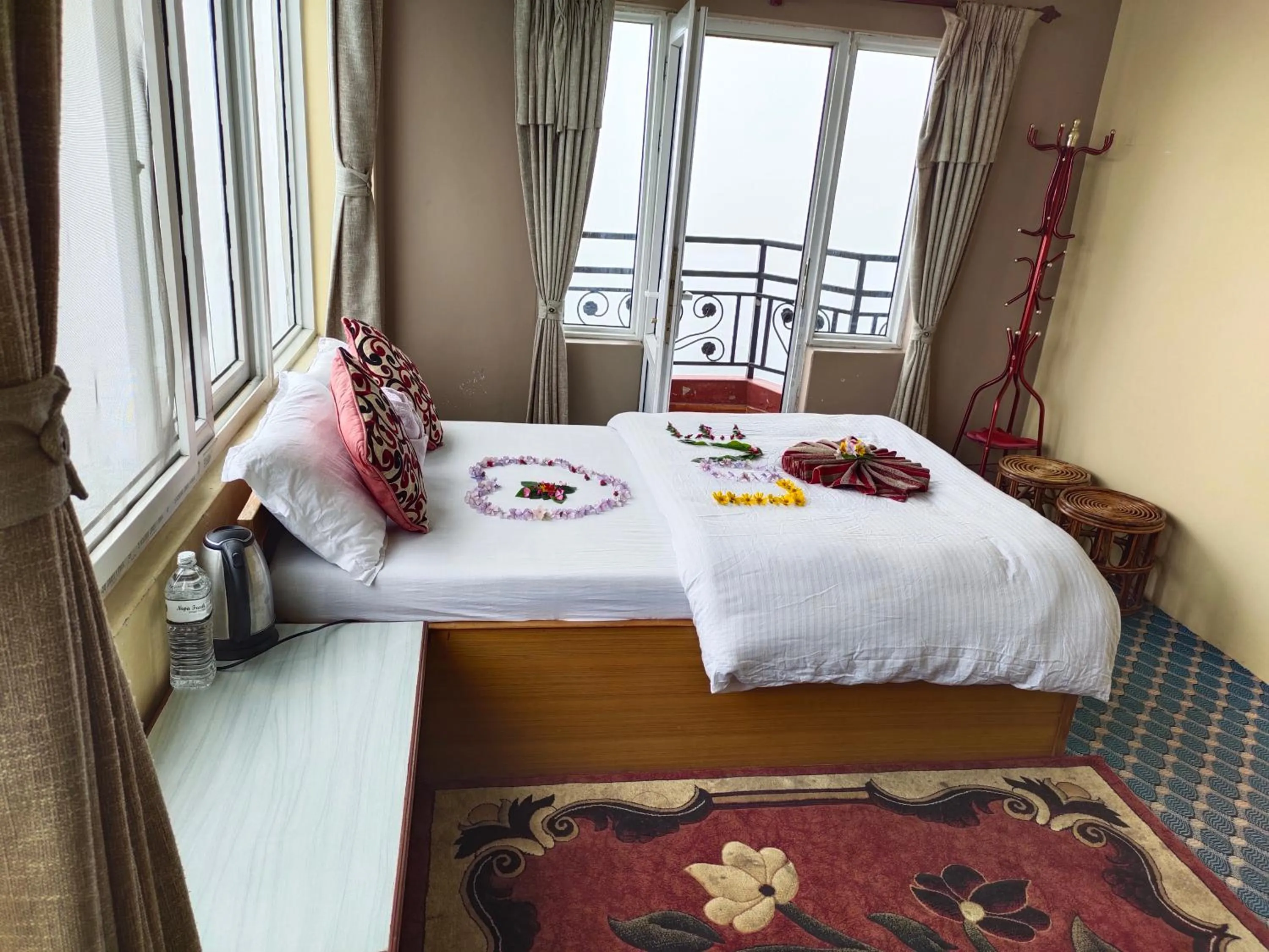 Photo of the whole room, Bed in Hotel High Ground Inn Sarangkot