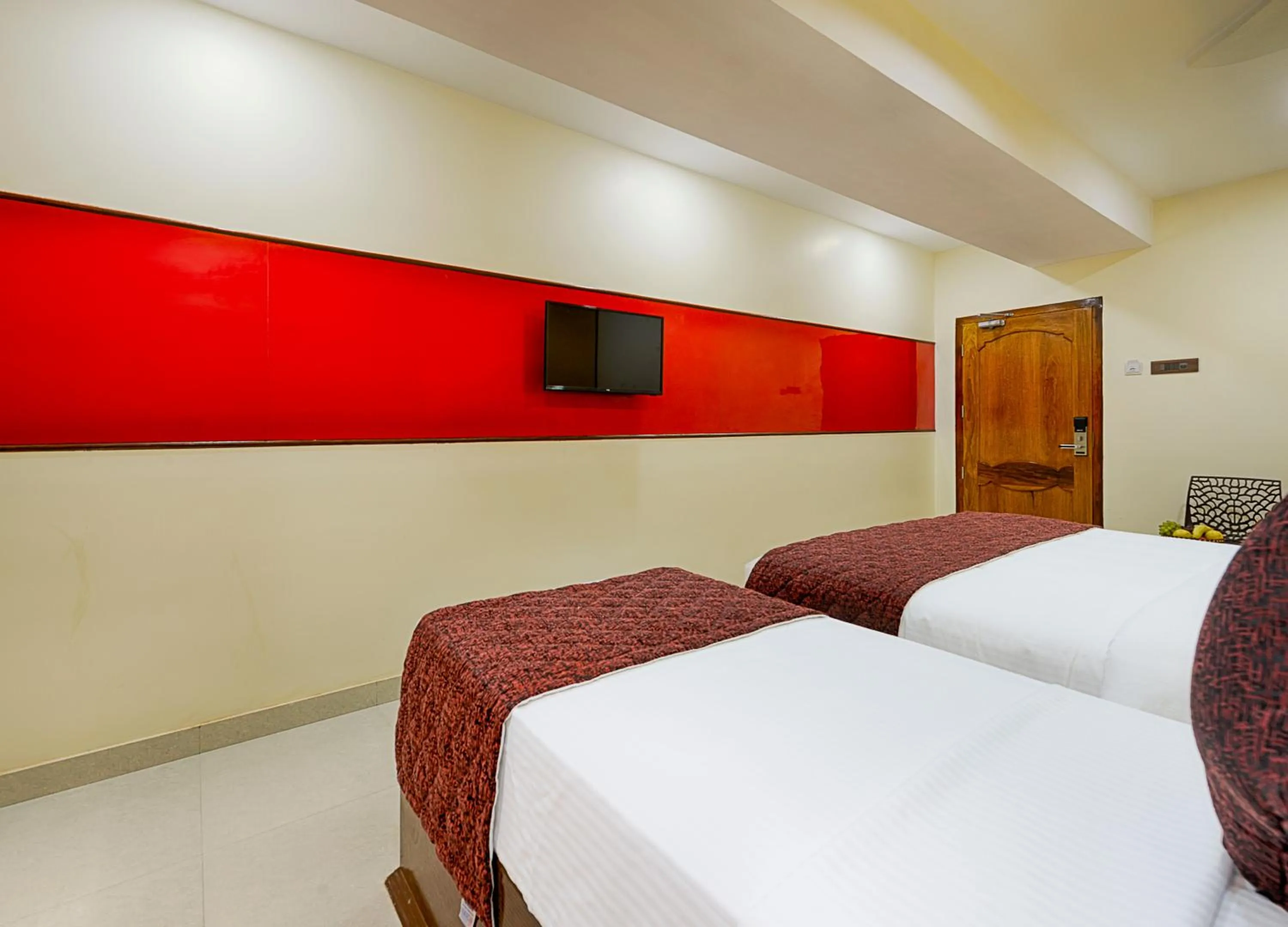 Bed in Hotel Ramraj Regency