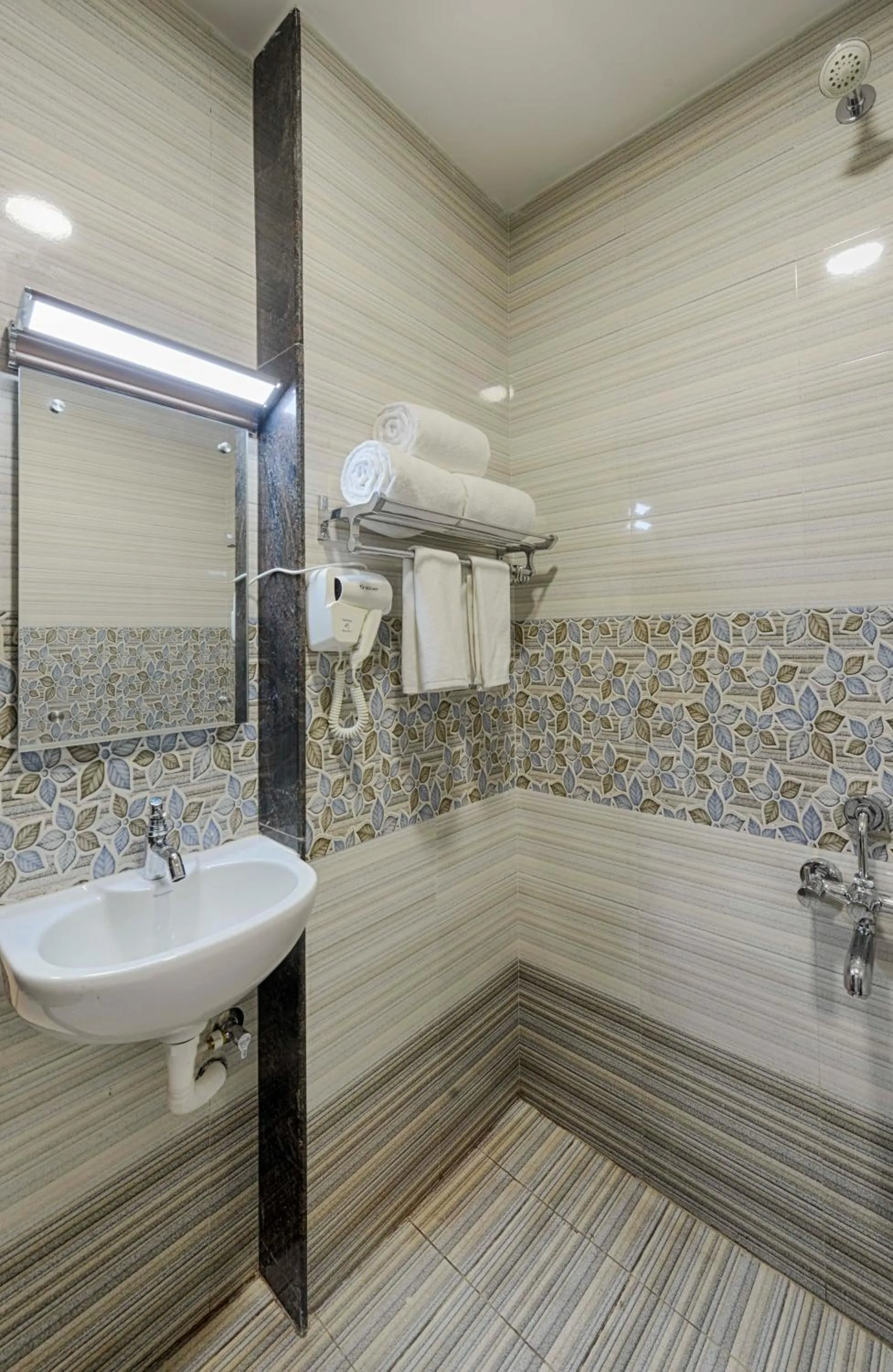 Bathroom in Hotel Ramraj Regency