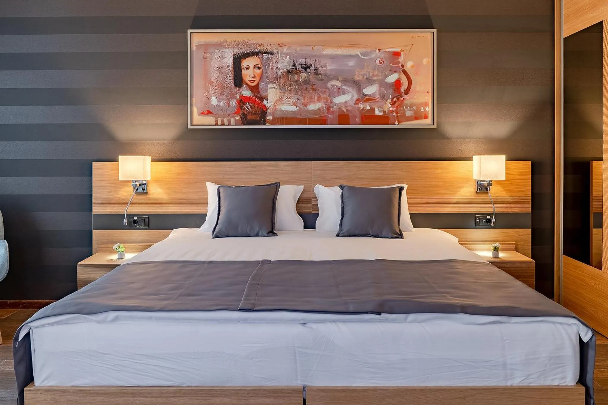 Bed in Rubicon Garni Hotel