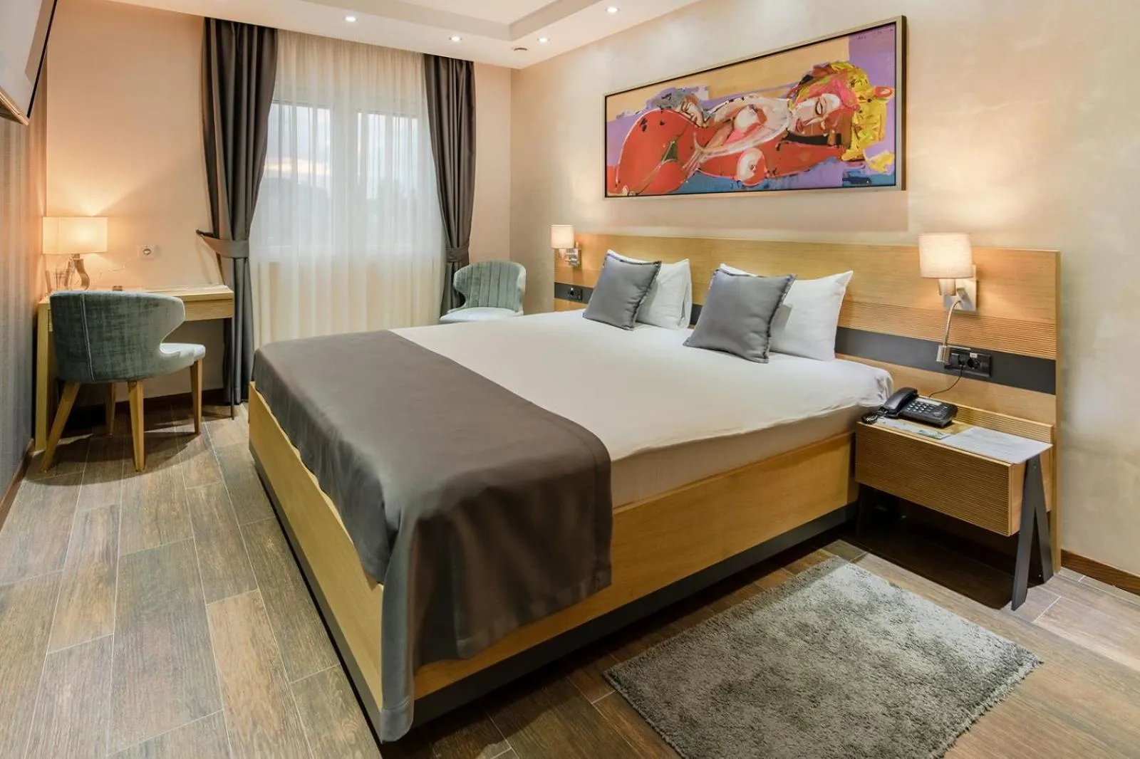 Bed in Rubicon Garni Hotel