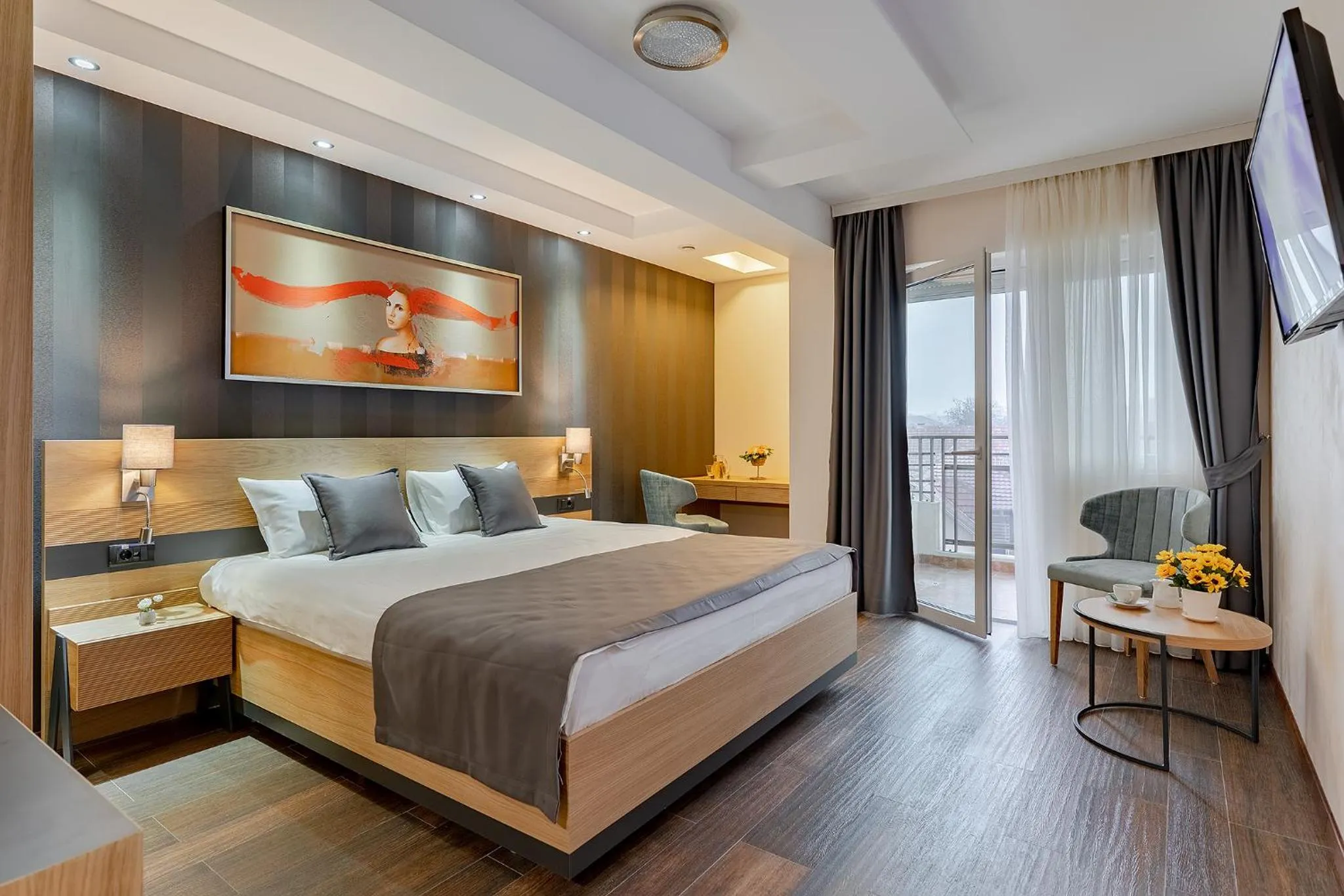 Bed in Rubicon Garni Hotel