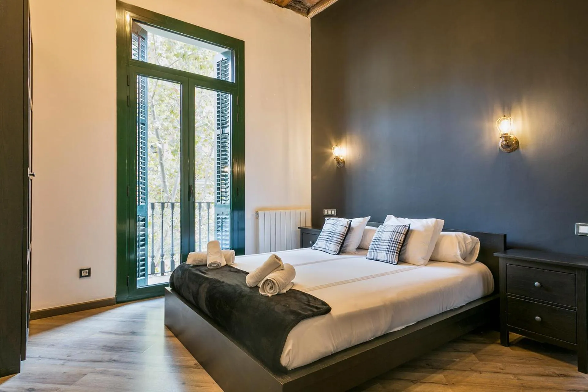 Bed in Midtown Luxury Apartments by Sweett