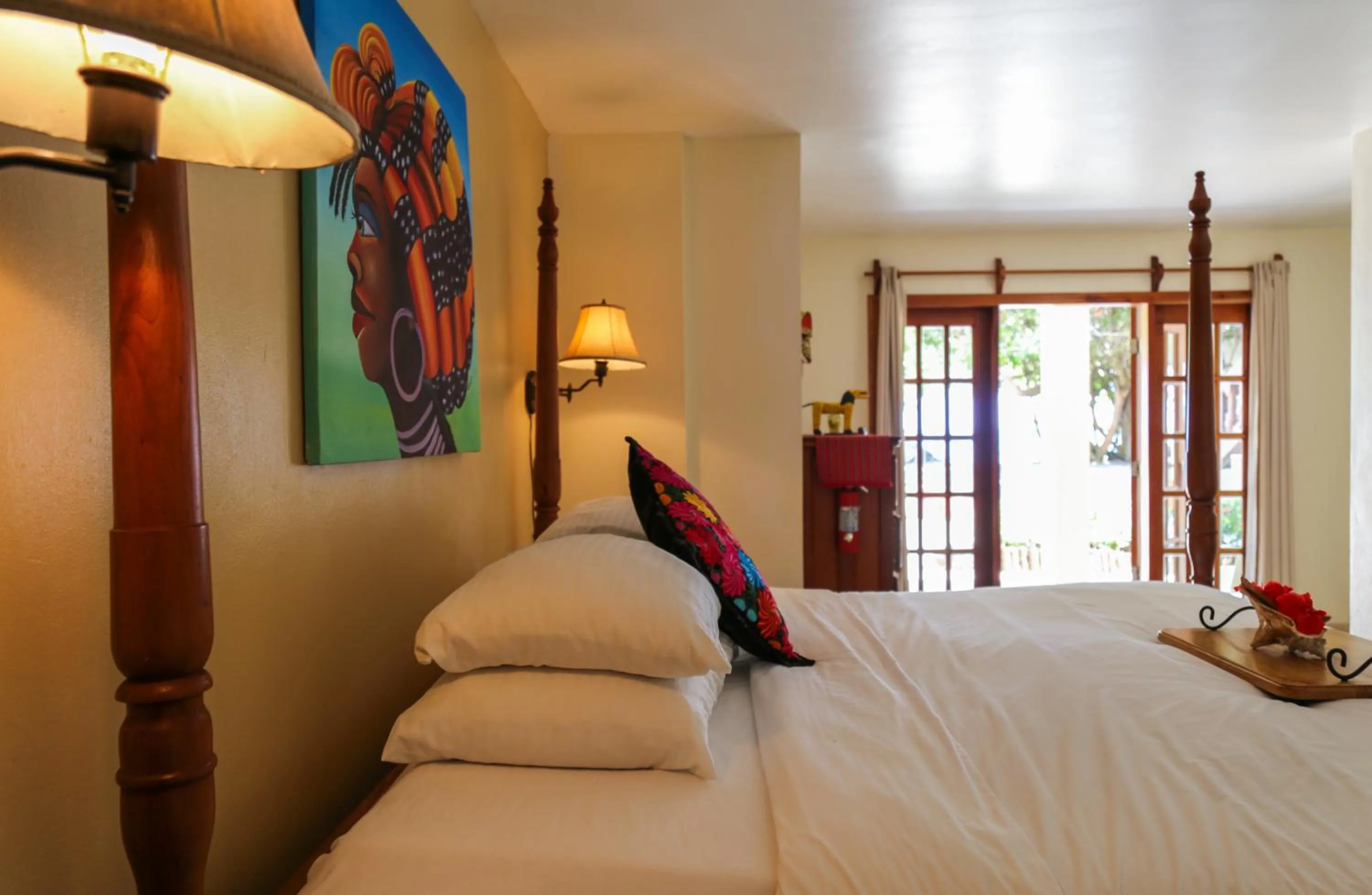 Bed in The Colonial at Jaguar Reef