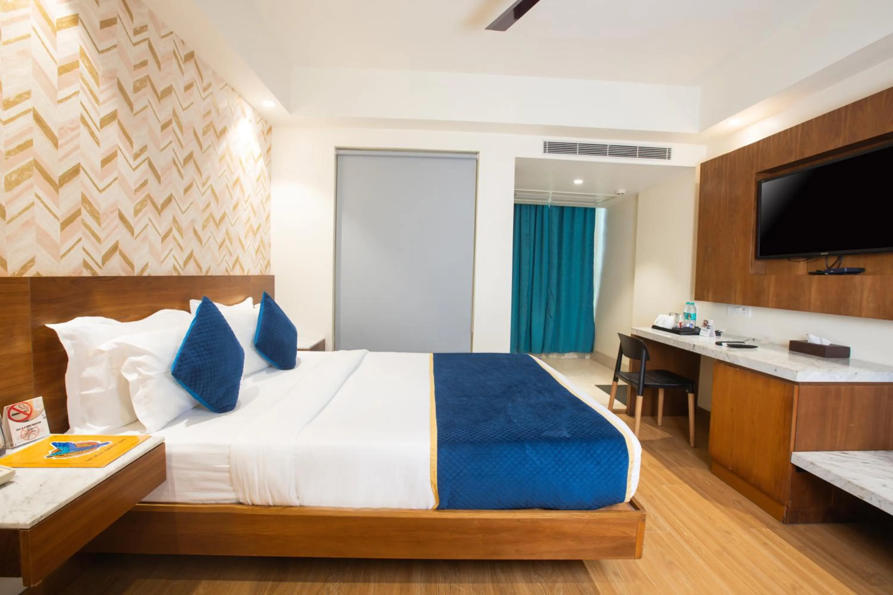 Photo of the whole room, Bed in The Orion Plaza - Nehru Place