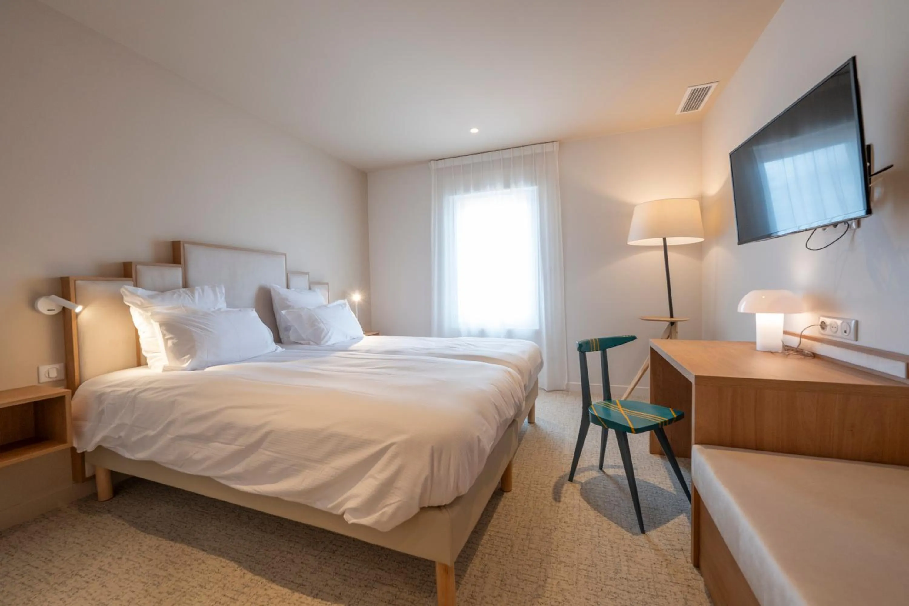 Bed in Hôtel Les Pins - Oléron