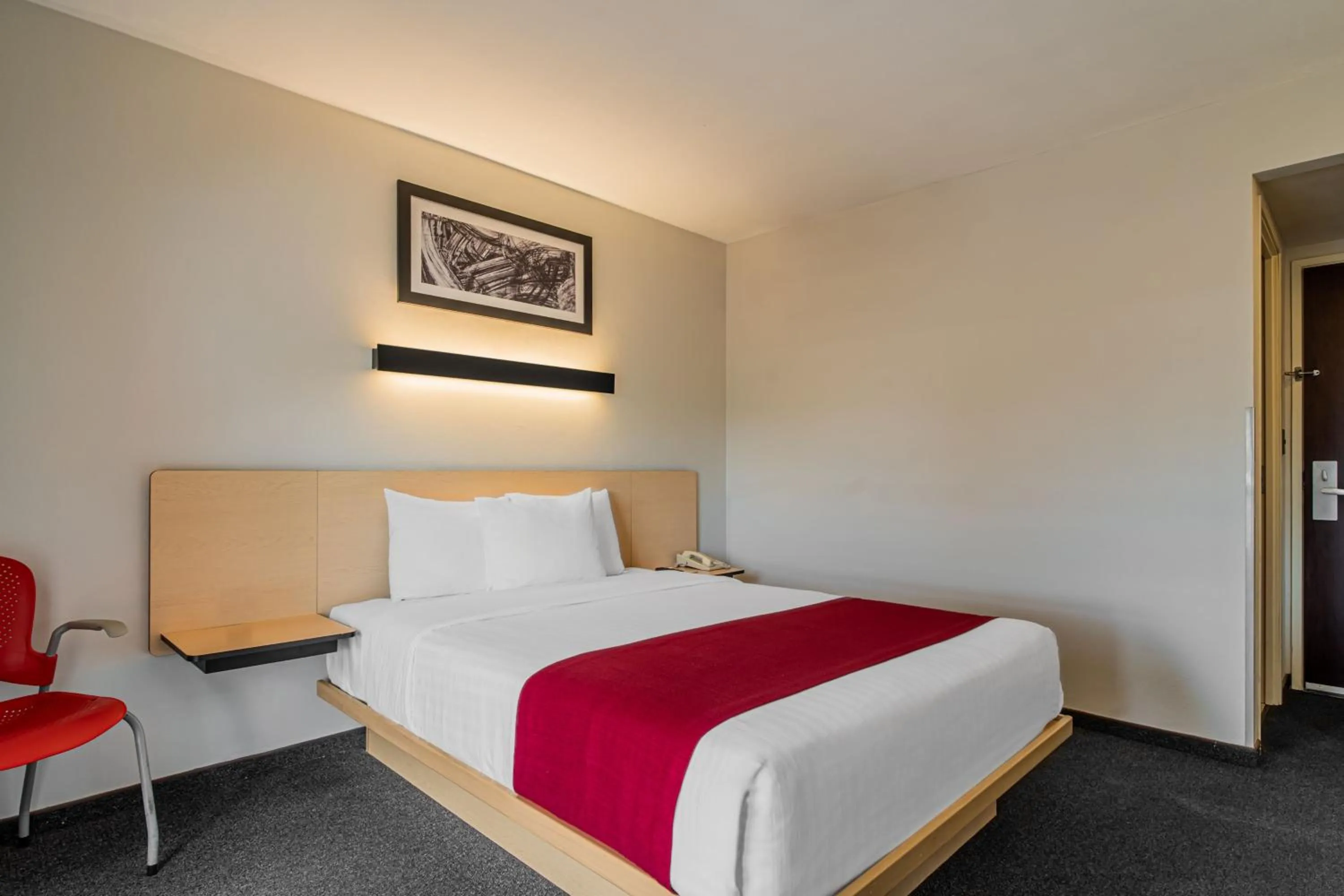 Photo of the whole room, Bed in City Express by Marriott Queretaro Jurica