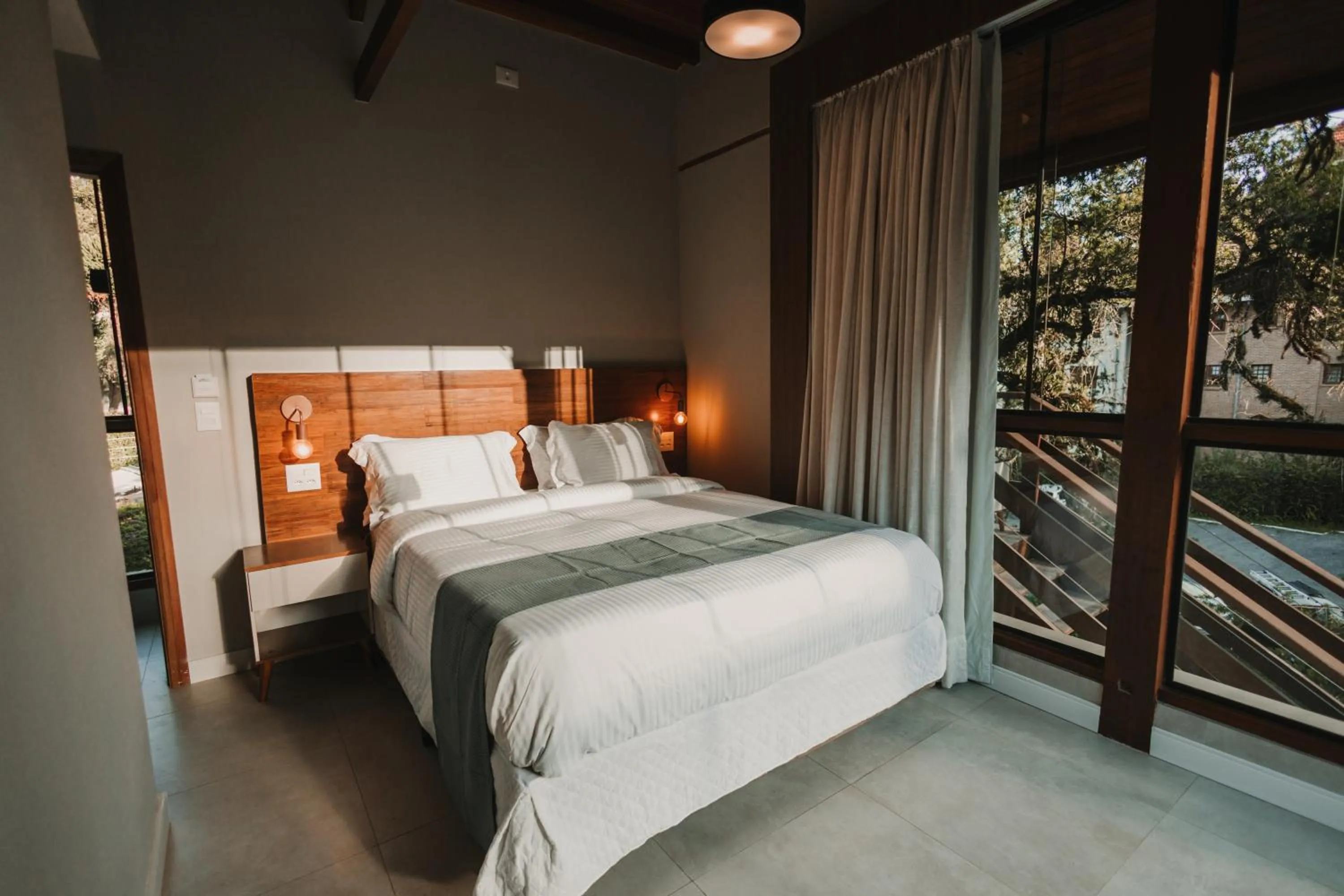 Bed in La Brume Pousada