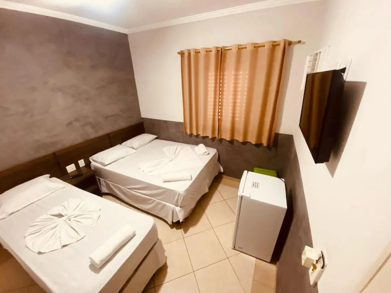 Bed in Pousada Jovimar