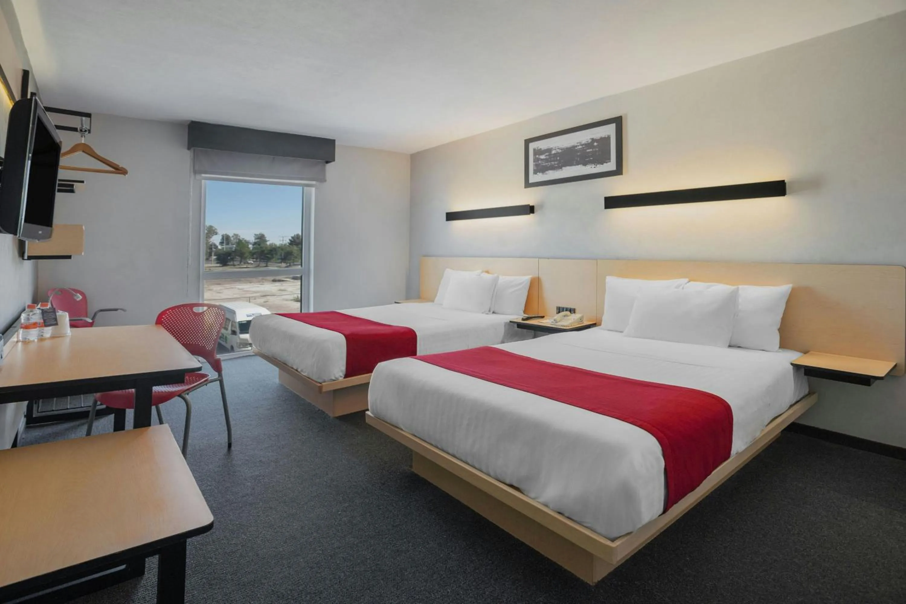 Photo of the whole room, Bed in City Express by Marriott Durango
