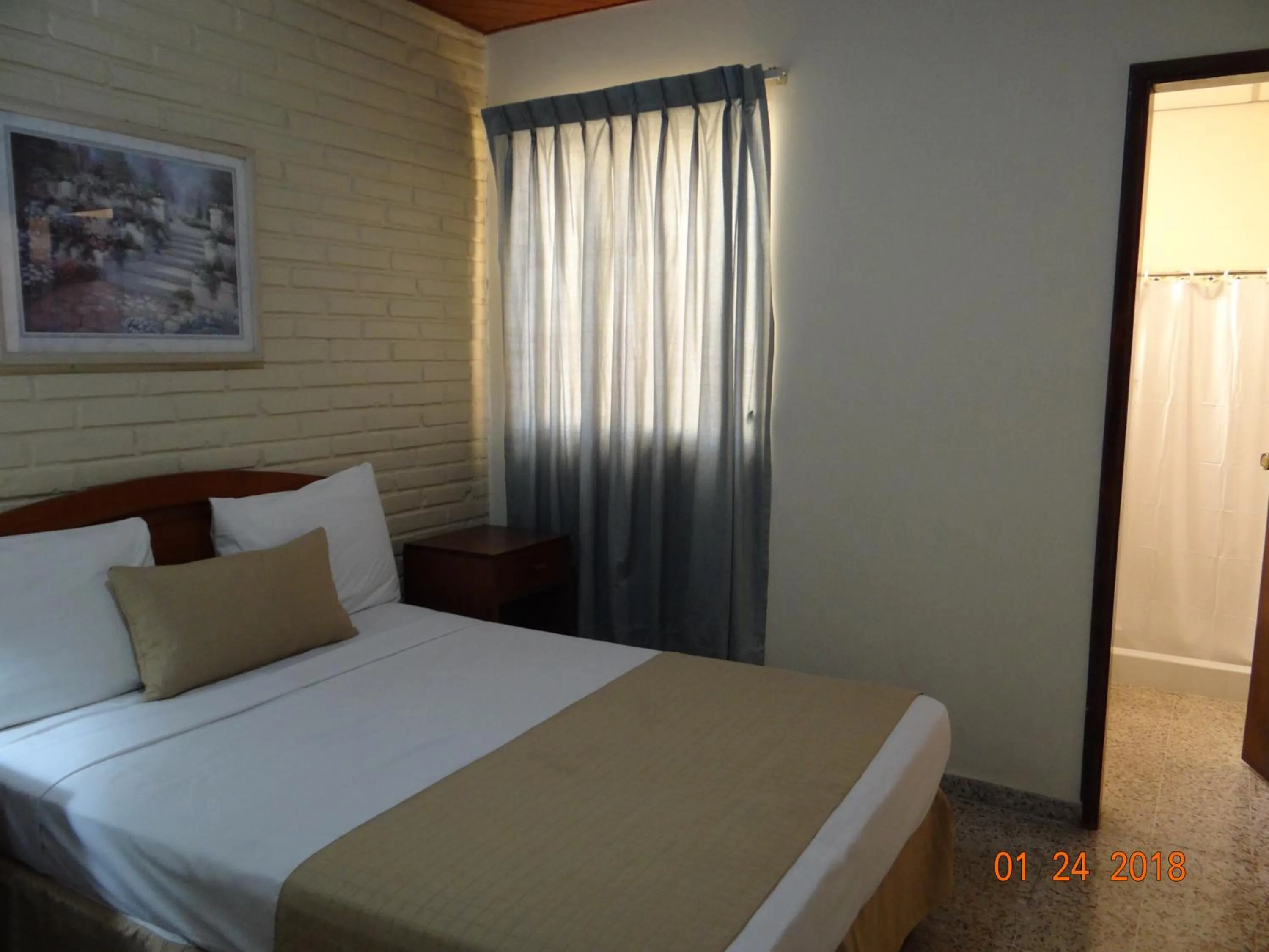 Bed in Hotel Mac Arthur