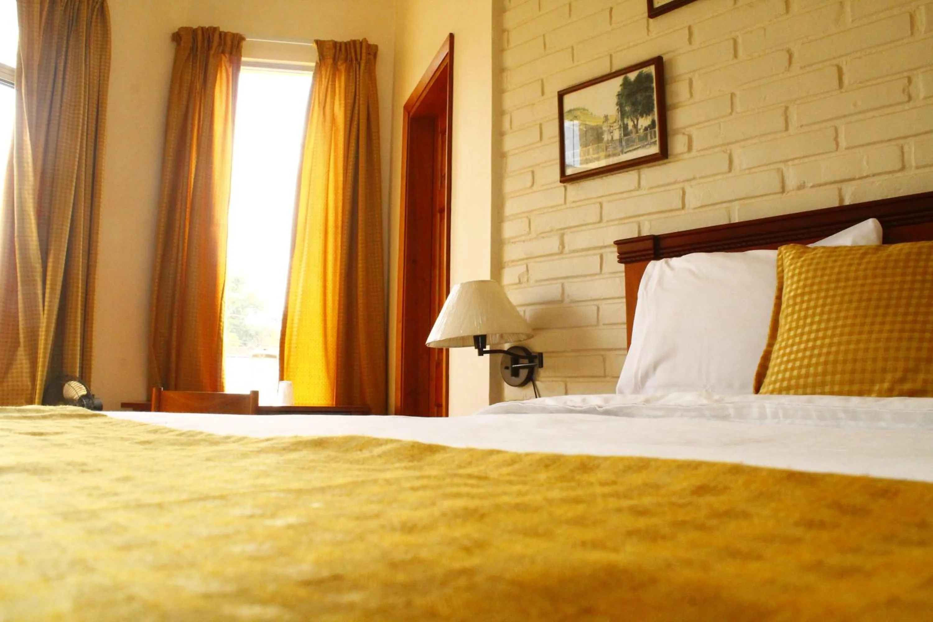 Bed in Hotel Mac Arthur