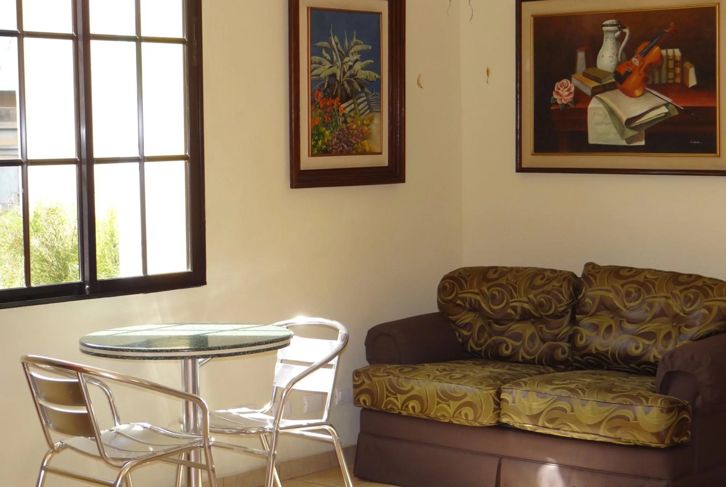 Living room in Hotel Mac Arthur