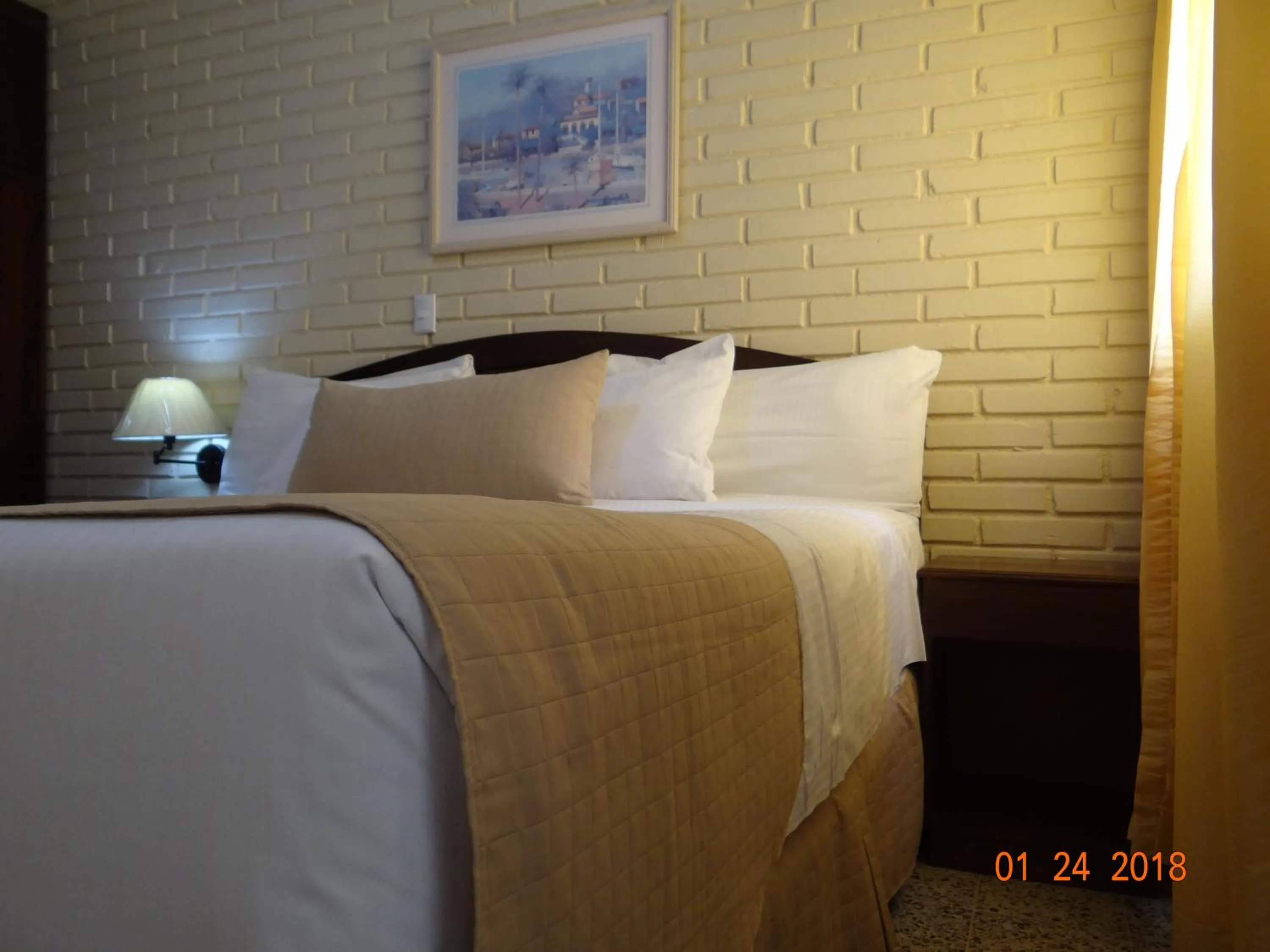 Bed in Hotel Mac Arthur