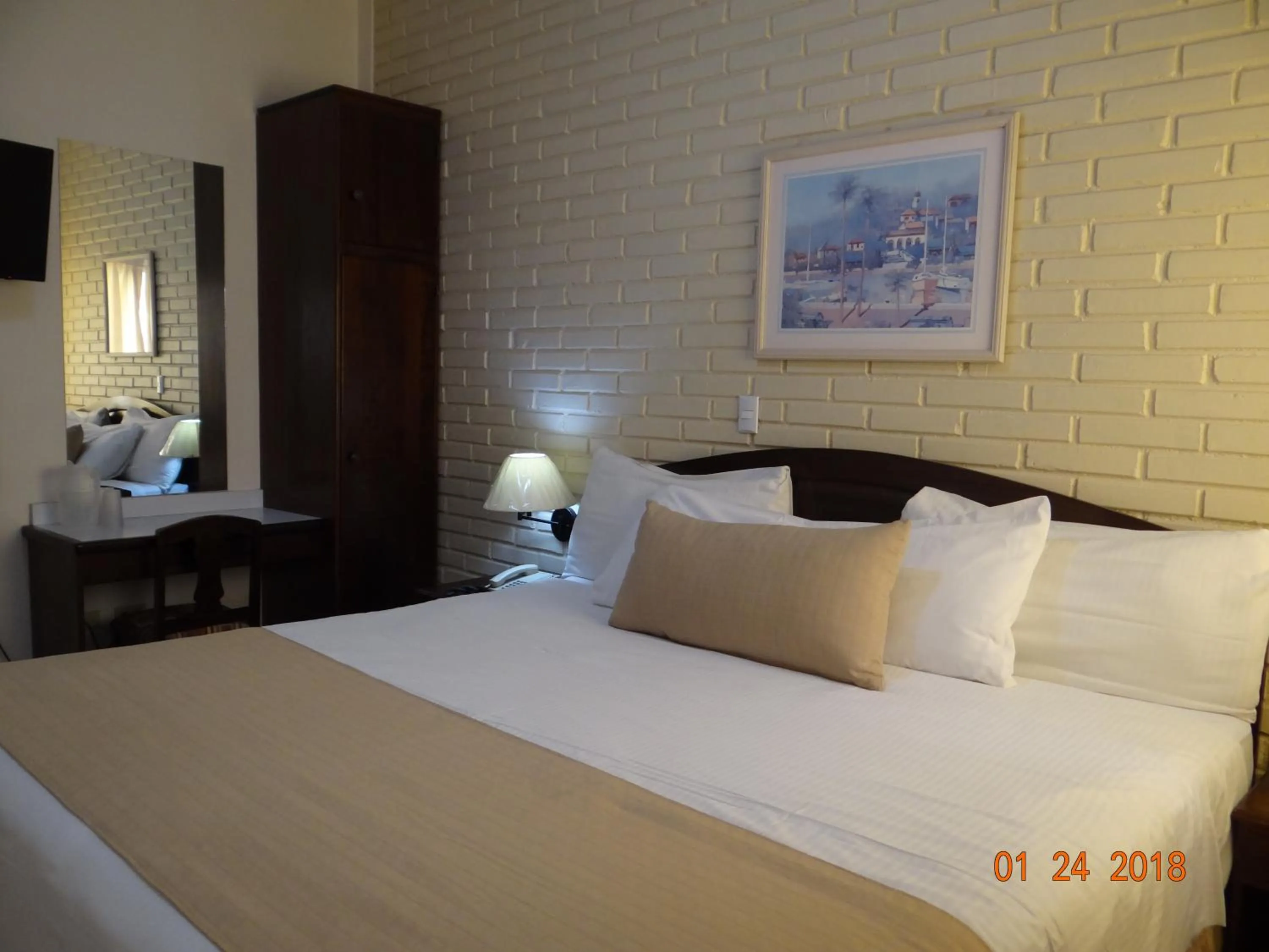 Bed in Hotel Mac Arthur