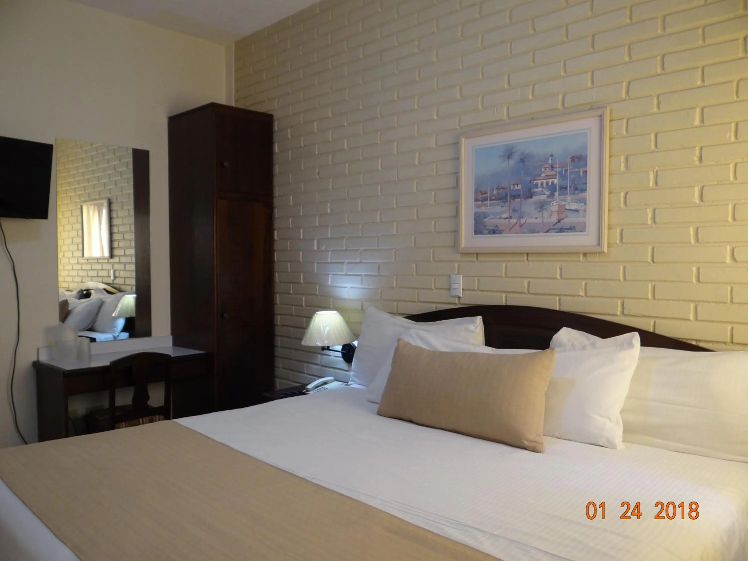 Bed in Hotel Mac Arthur