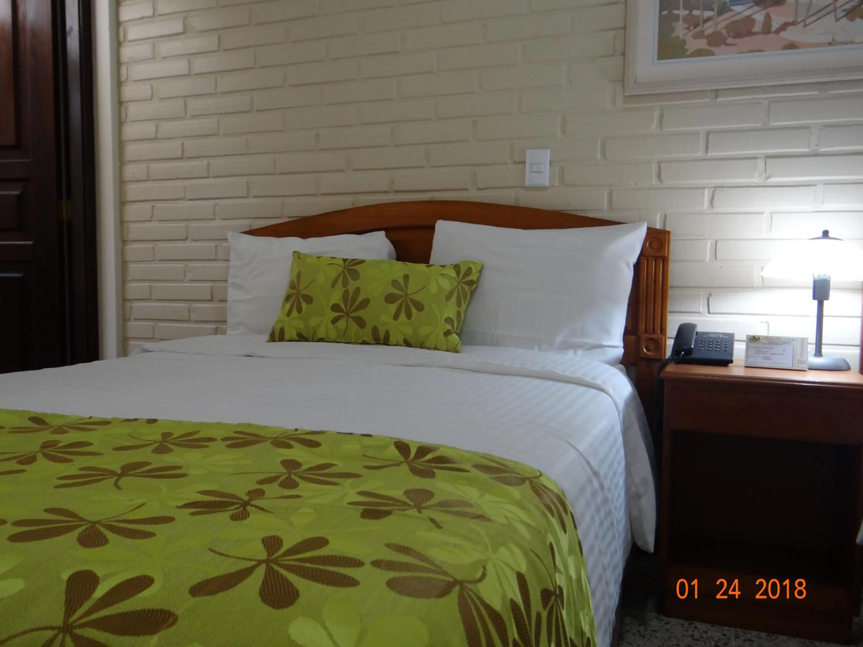 Bed in Hotel Mac Arthur