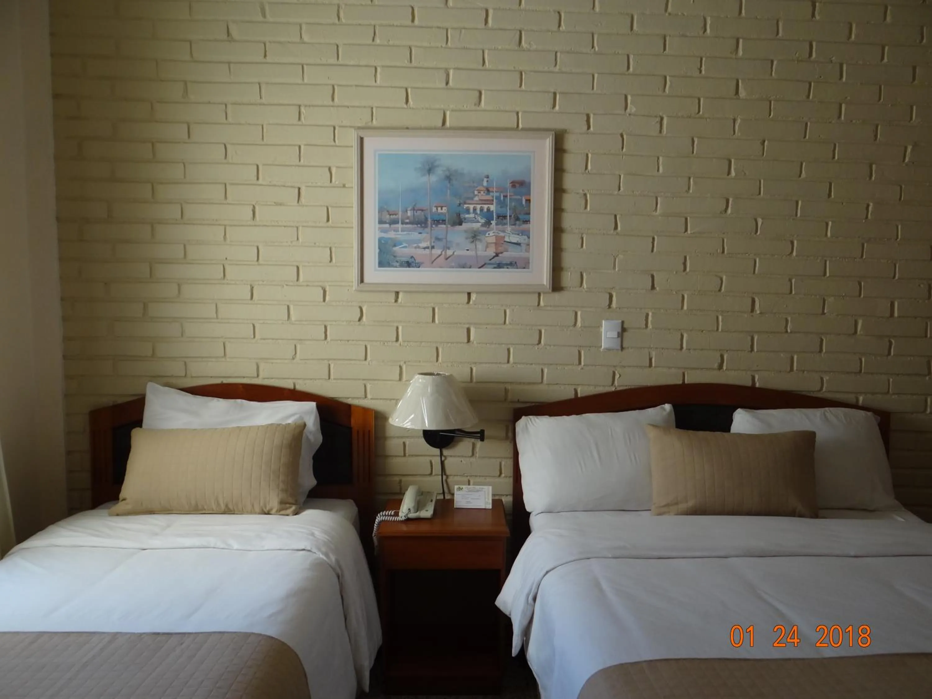 Bed in Hotel Mac Arthur