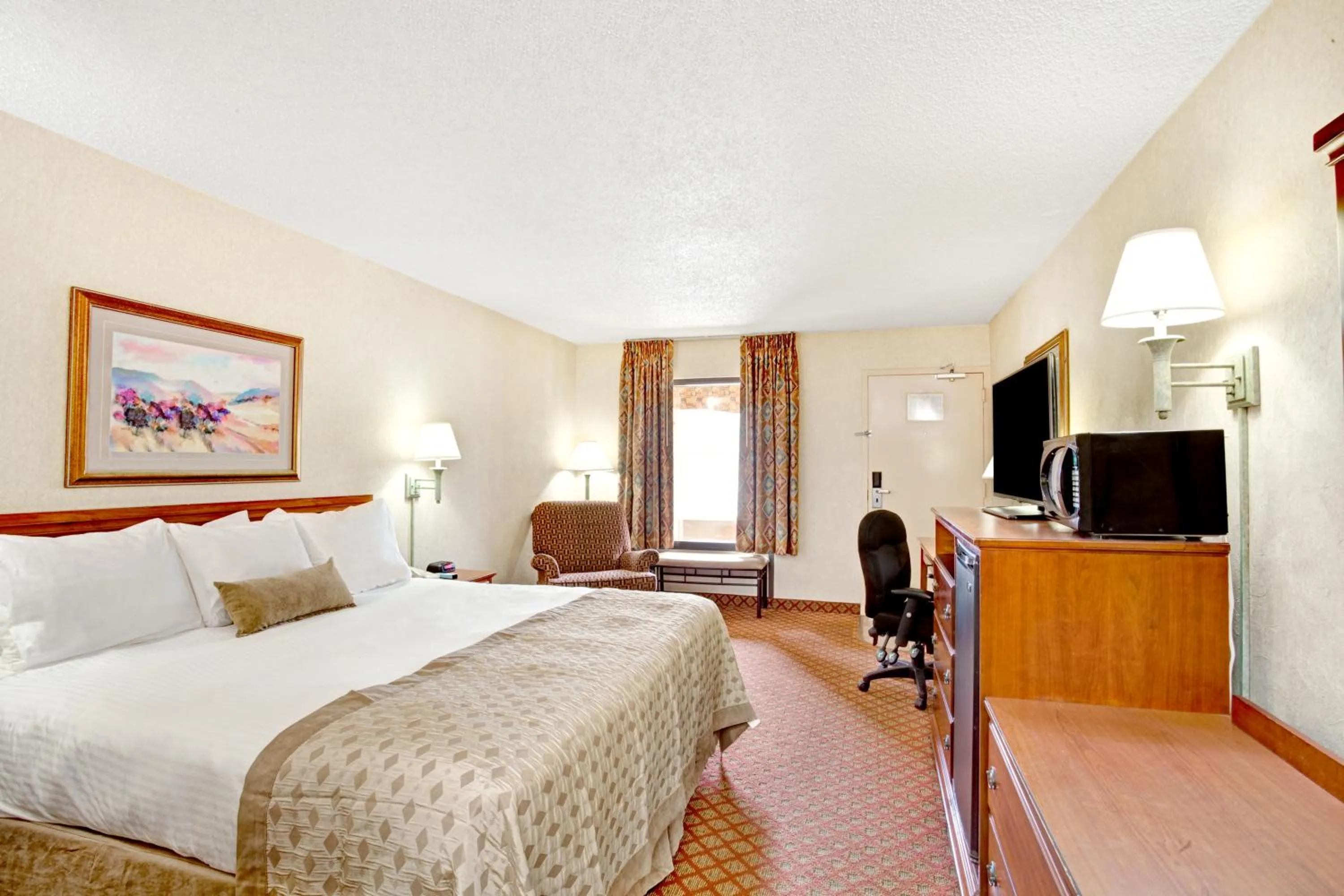 Bedroom, Bed in Ramada by Wyndham West Memphis