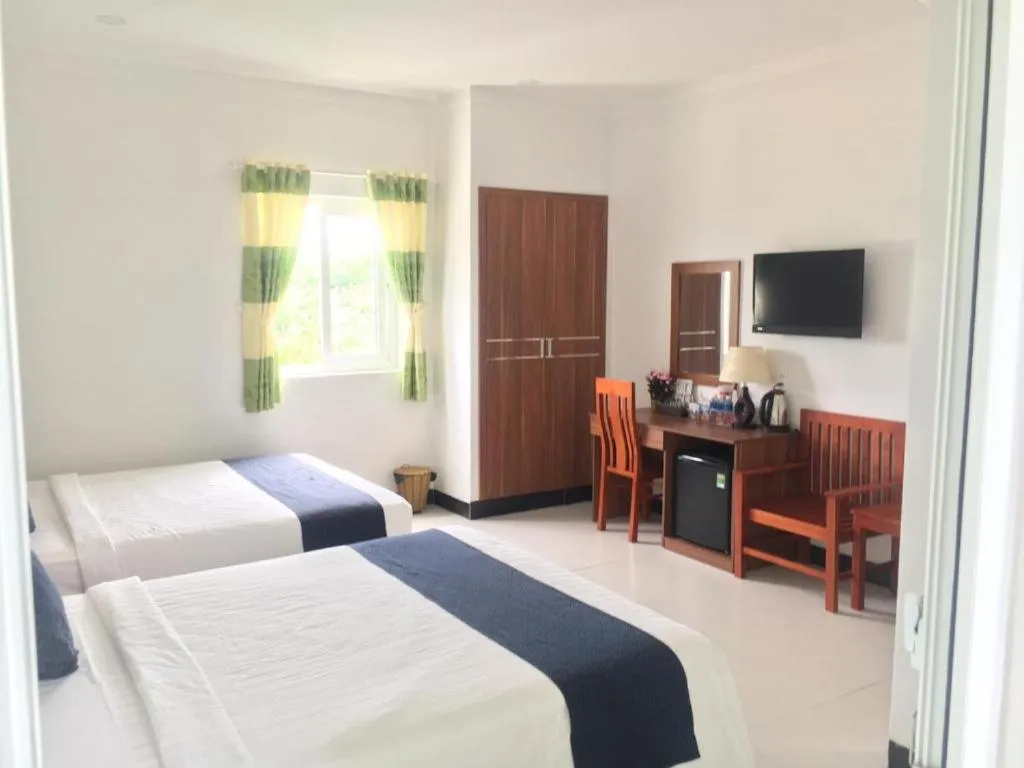 Photo of the whole room, Bed in PHAM GIA HOTEL Mui Ne