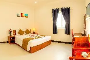 Bed in PHAM GIA HOTEL Mui Ne