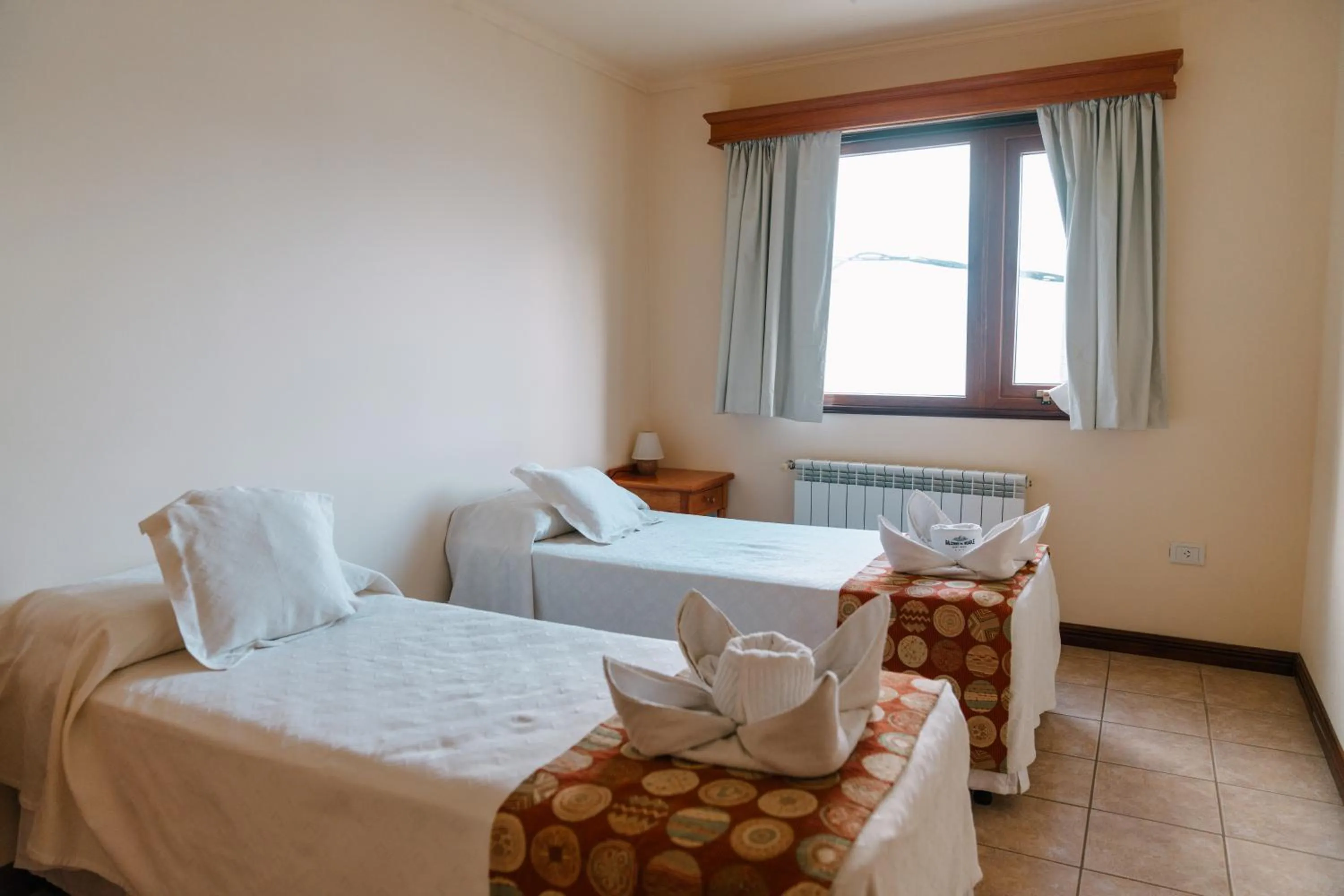 towels, Bed in Balcones del Beagle Apart