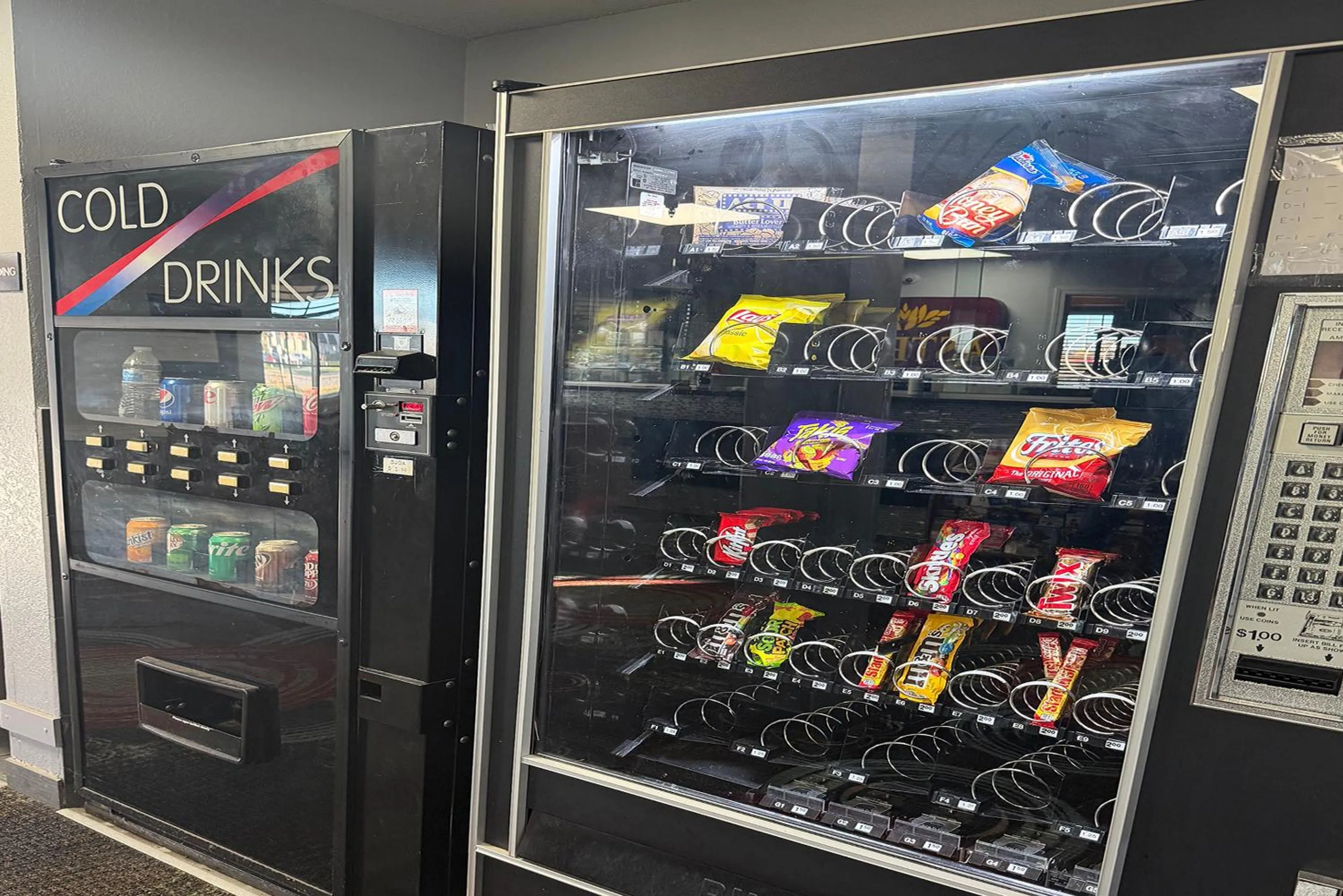 vending machine in Coratel Inn and Suites by Jasper Stillwater
