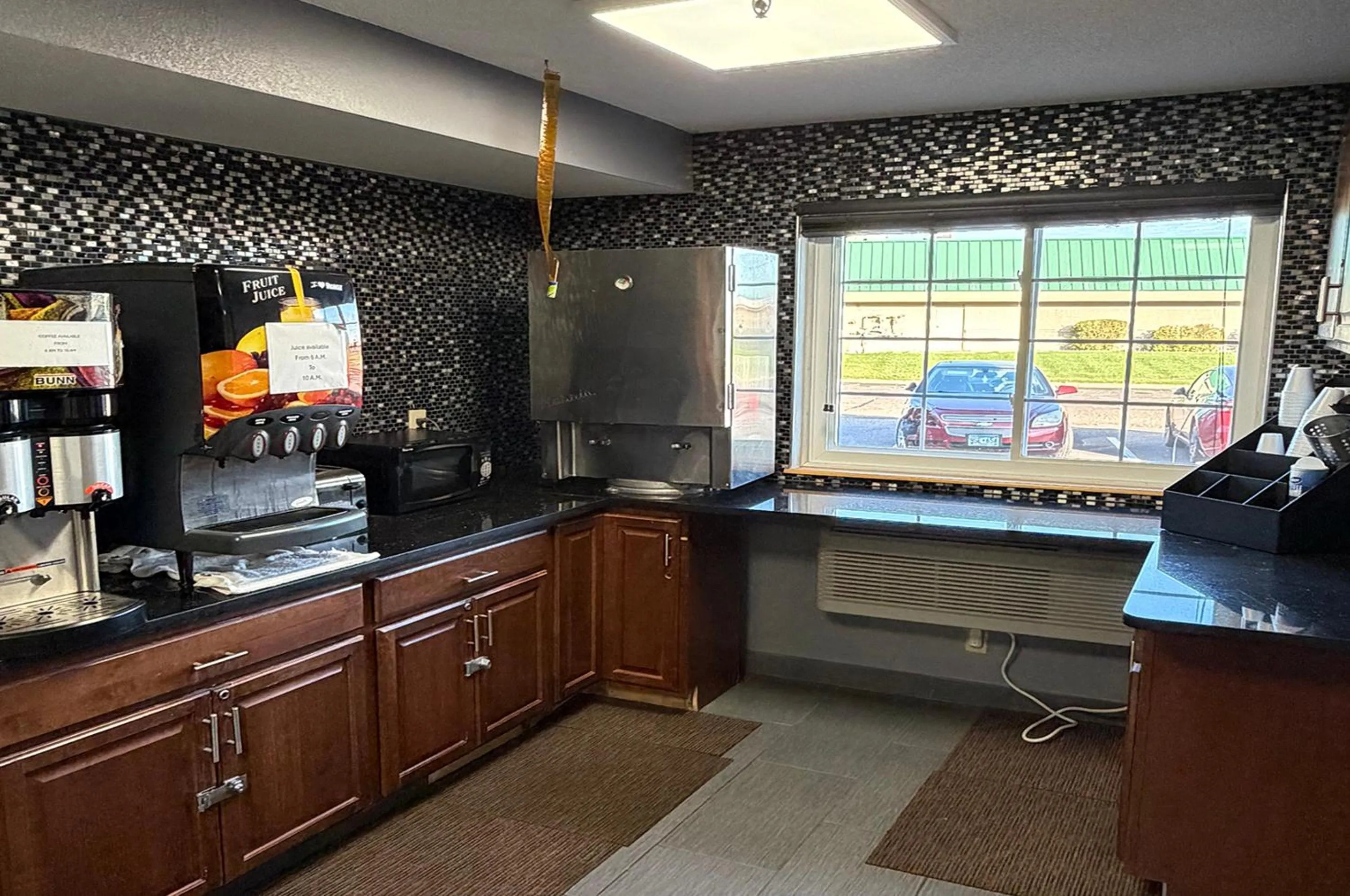 kitchen in Coratel Inn and Suites by Jasper Stillwater
