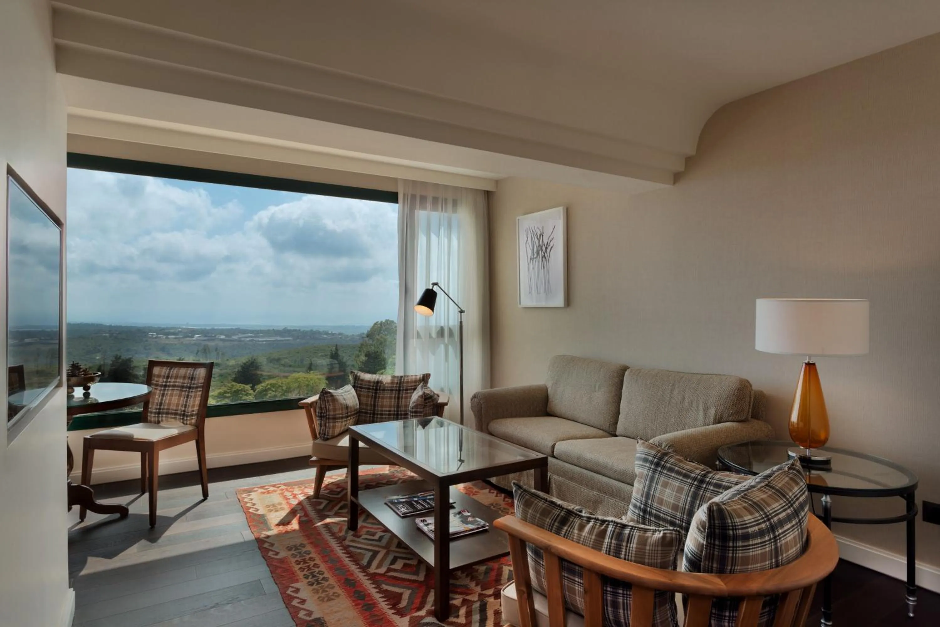 Living room in Carmel Forest by Isrotel Exclusive