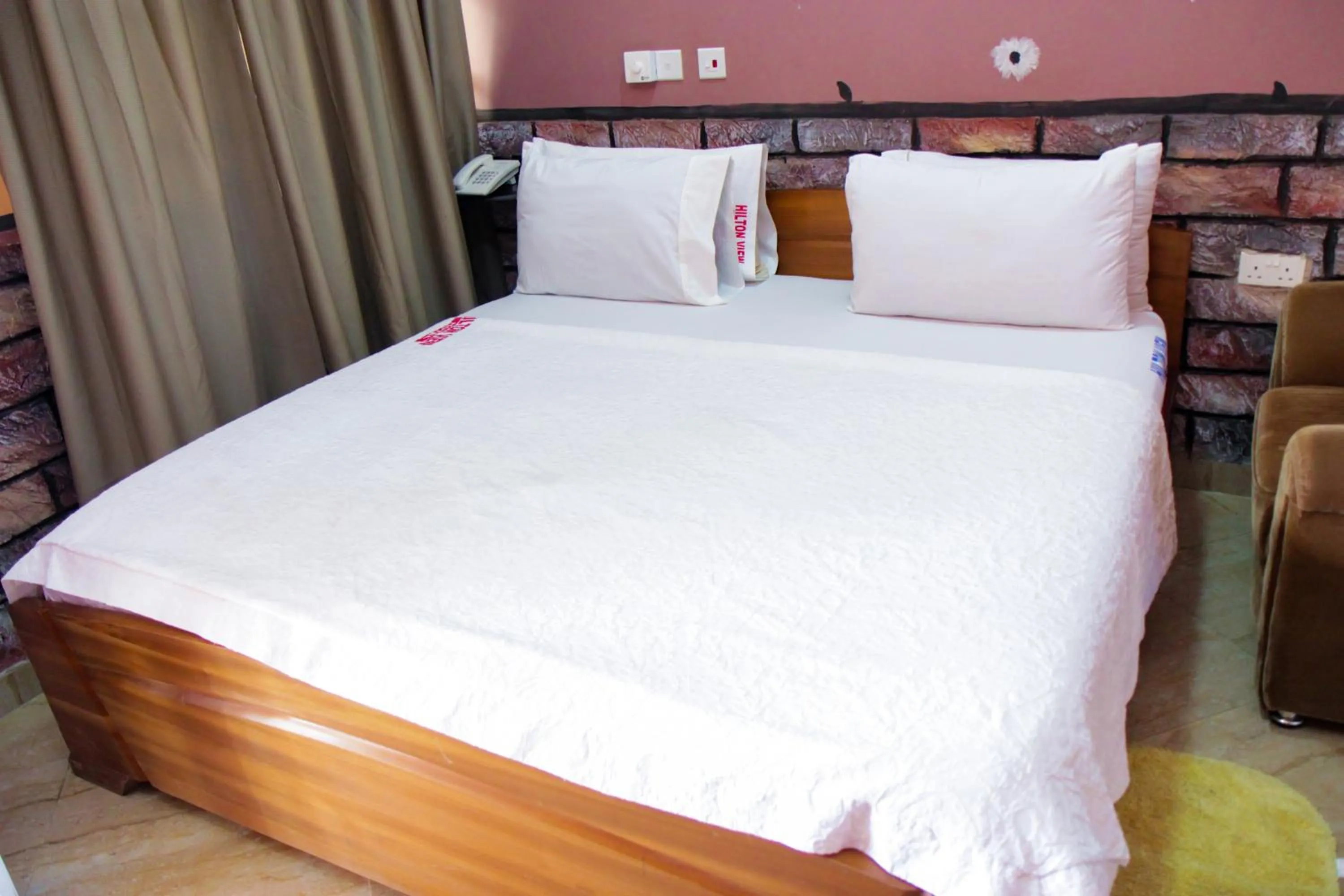 Bed in Hilton View Hotel