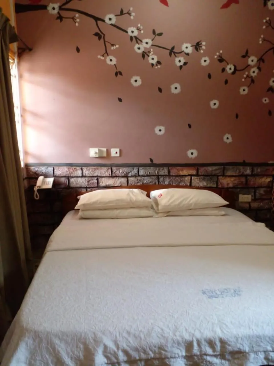 Bed in Hilton View Hotel