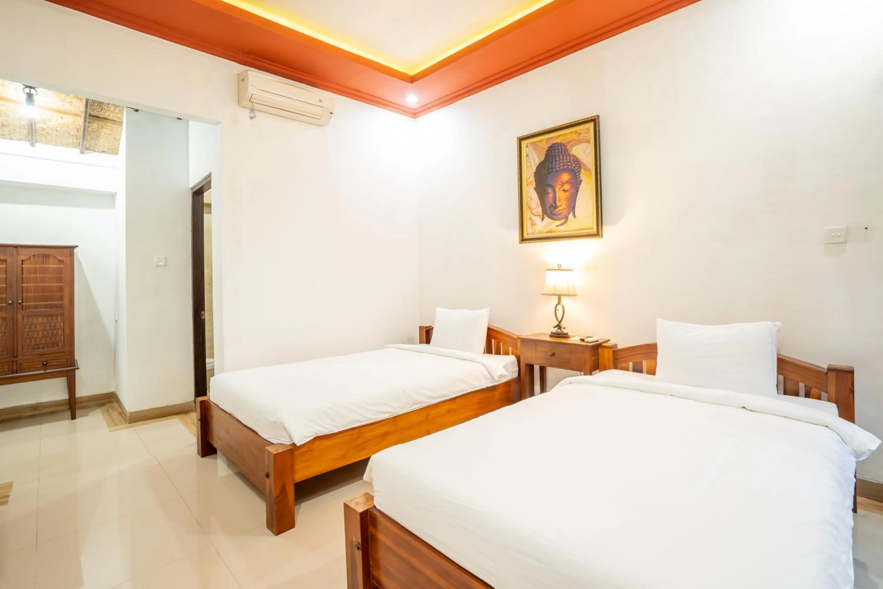 Bed in Nirmala Guest House Surf Keramas