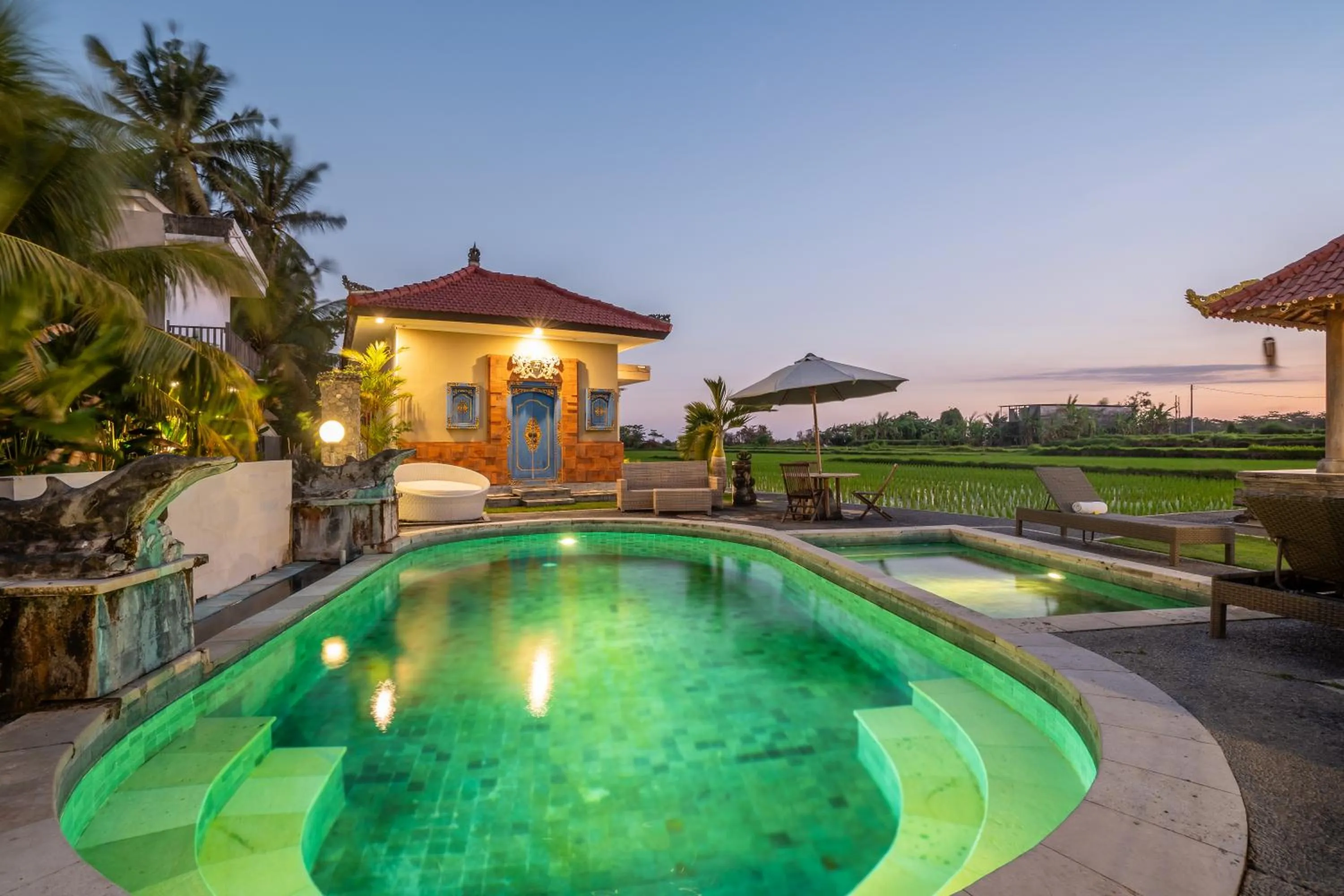 Swimming pool in Nirmala Guest House Surf Keramas