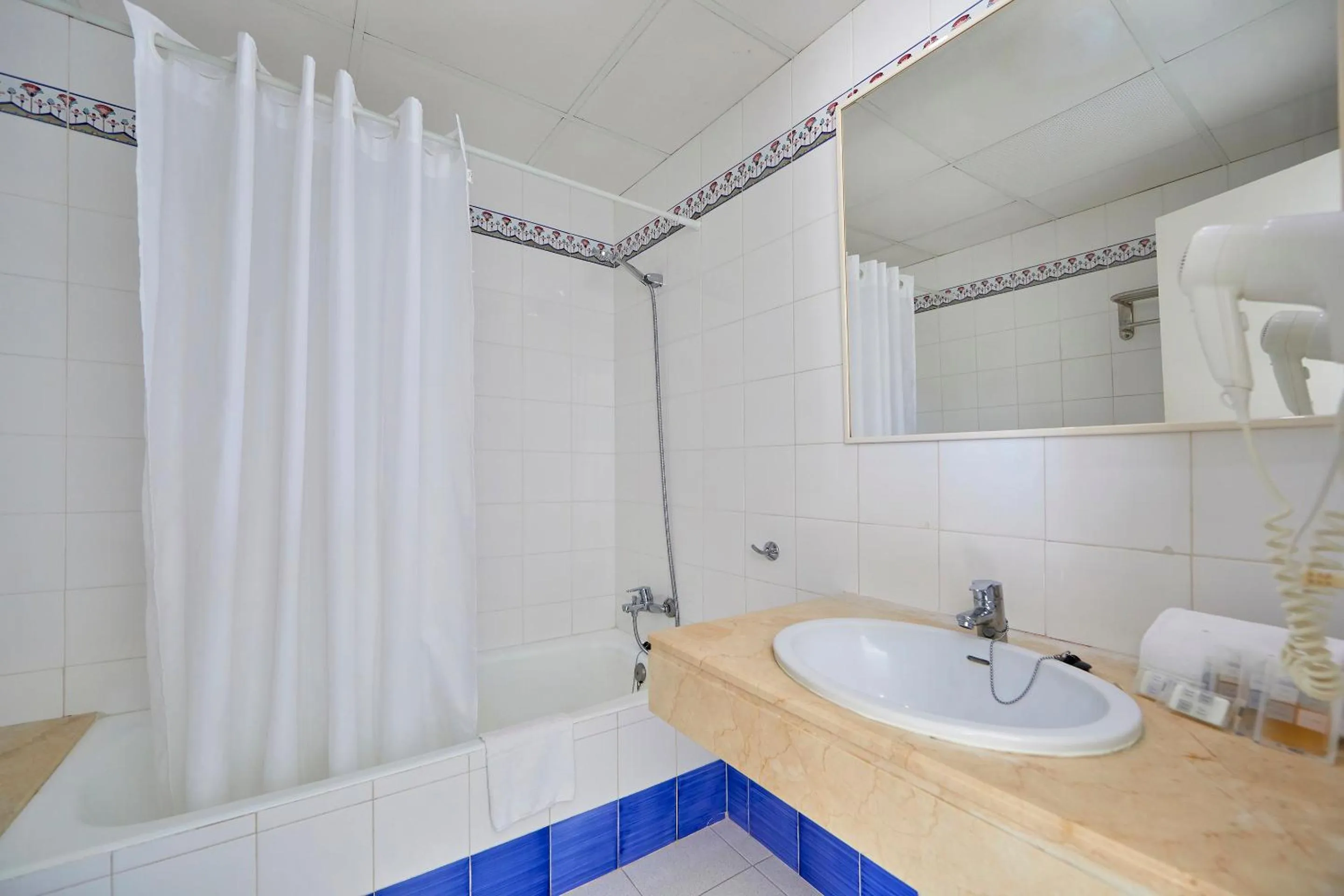 Bathroom in Gavimar Ariel Chico Hotel and Apartments