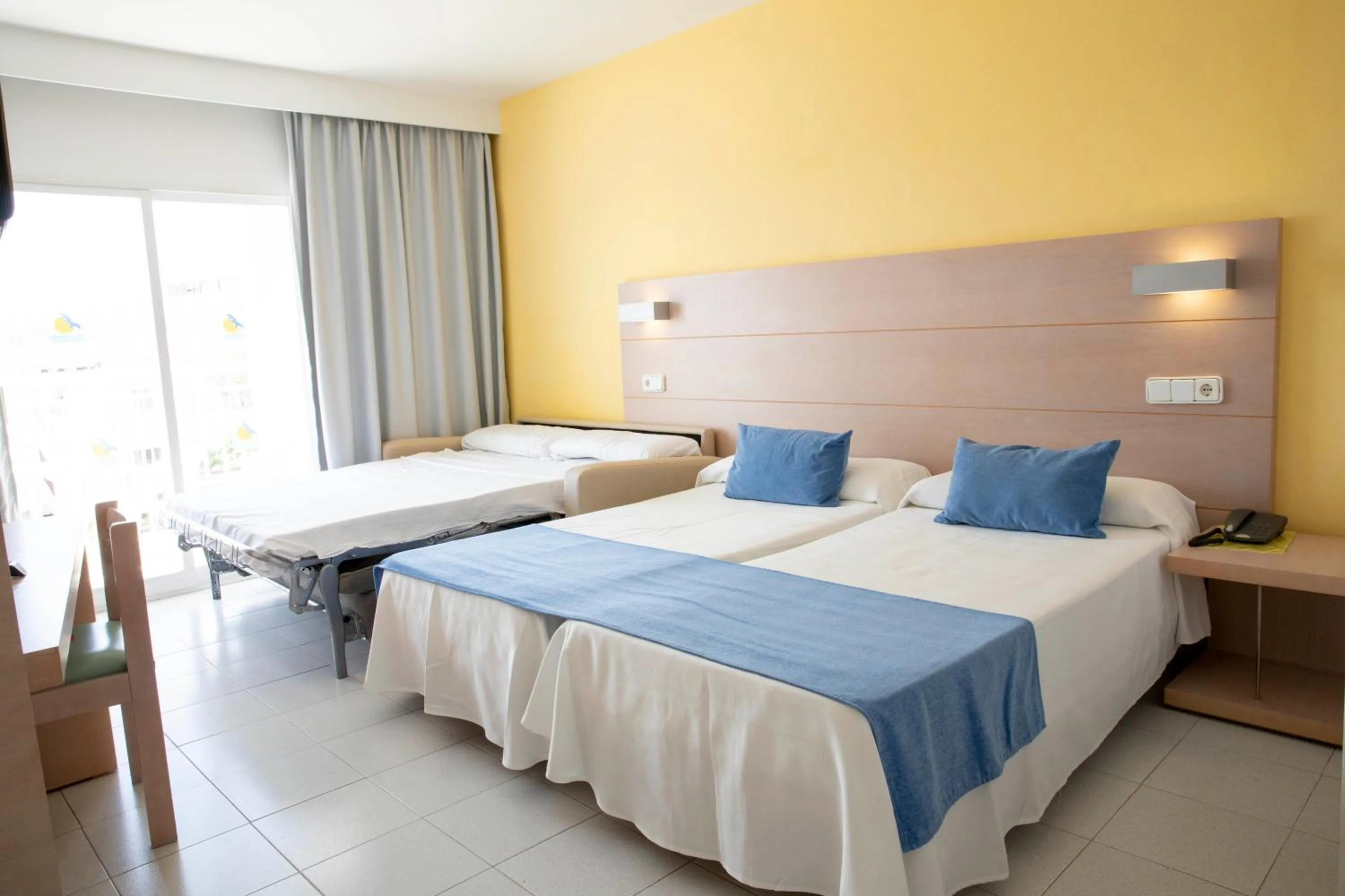 Bed in Gavimar Ariel Chico Hotel and Apartments