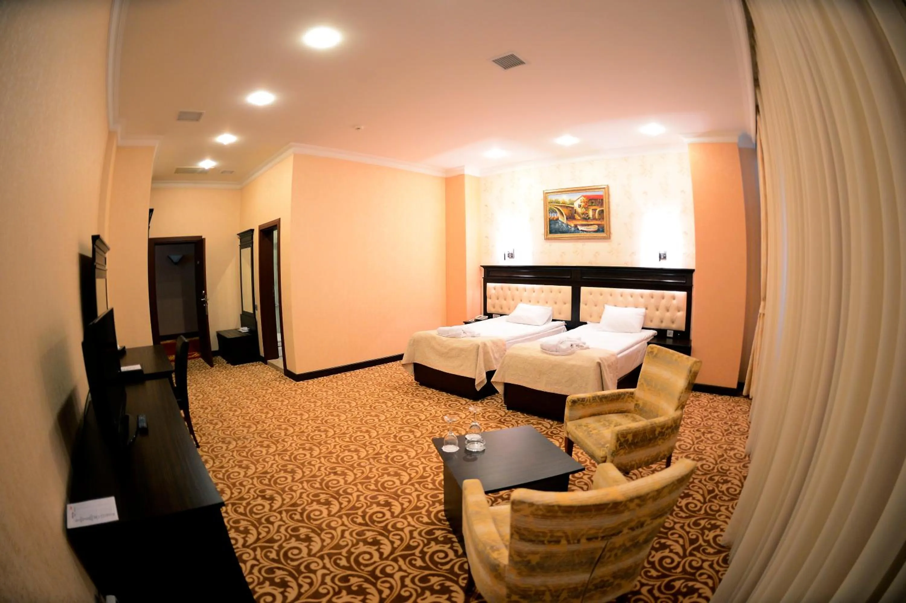 Bed in New Baku Hotel