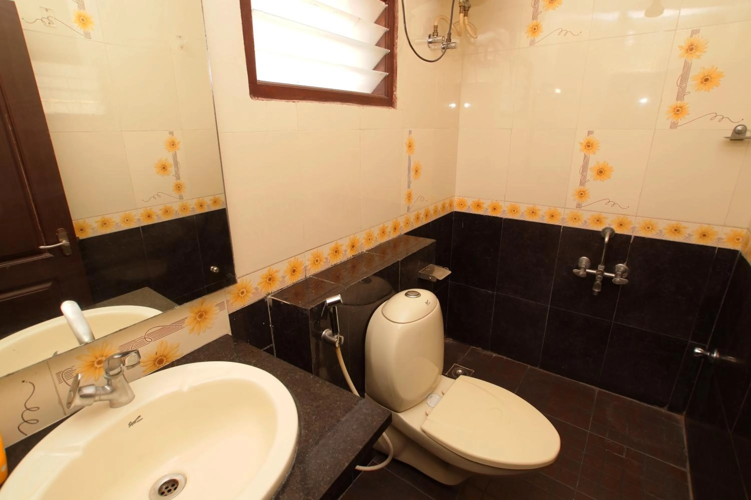 Toilet in Lloyds Serviced Apartments, Near Music Academy