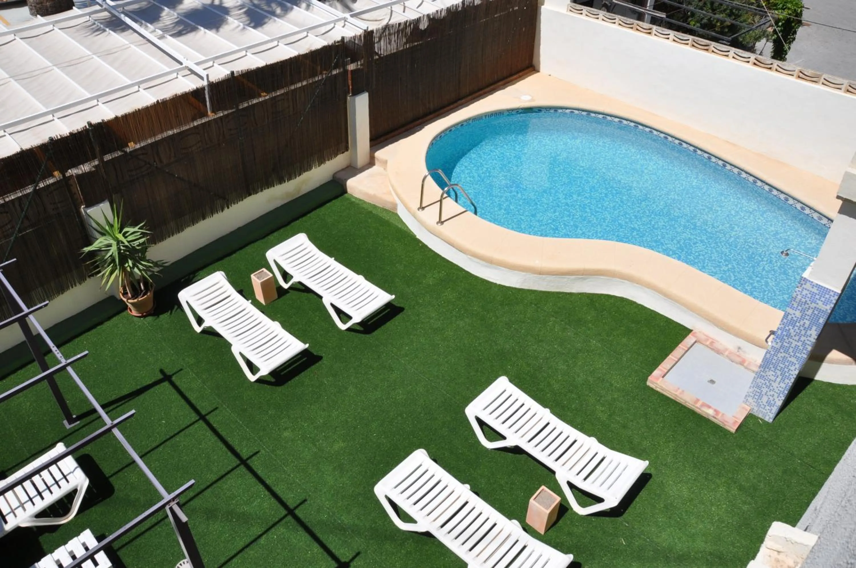 Swimming pool in Apartamentos Acuario