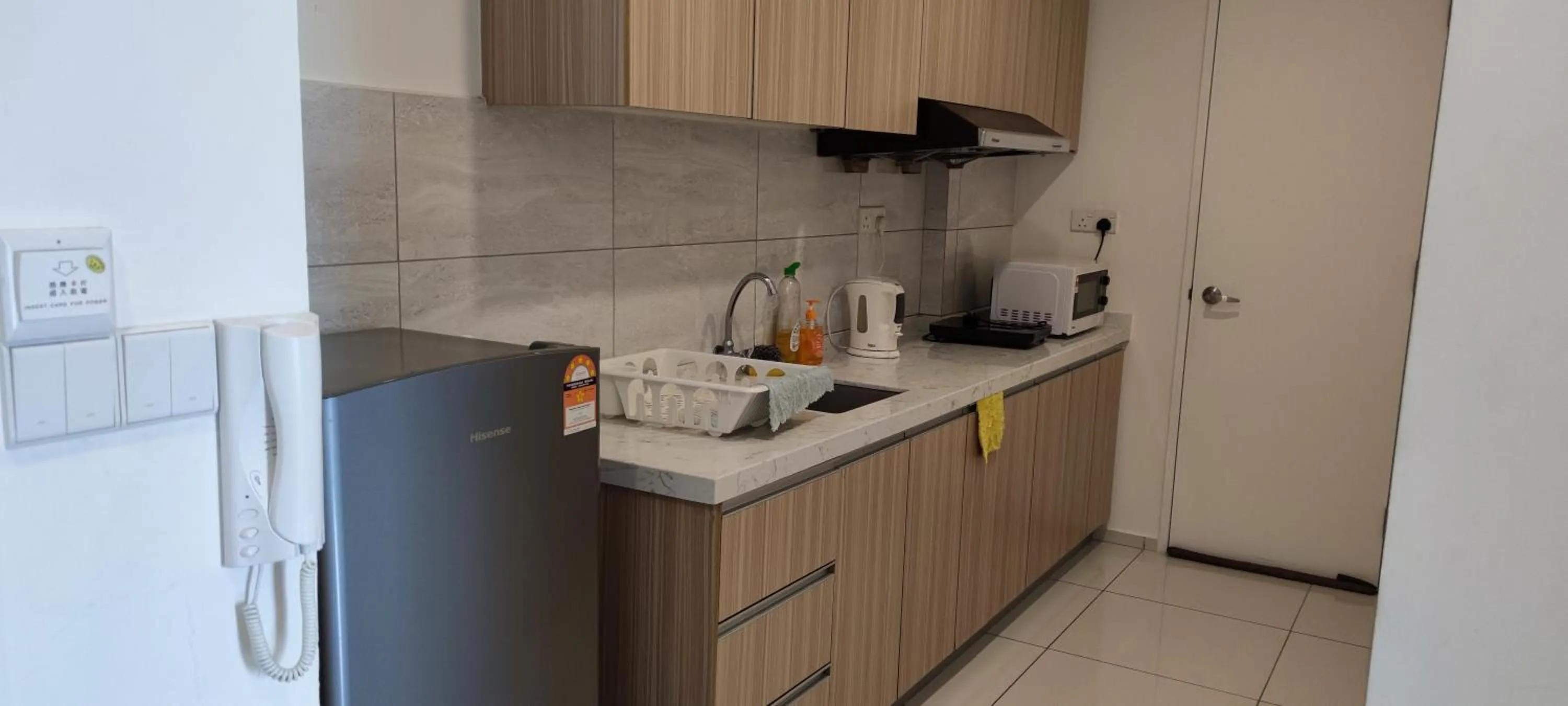 Kitchen or kitchenette in The Robertson Bukit Bintang by Wowhome