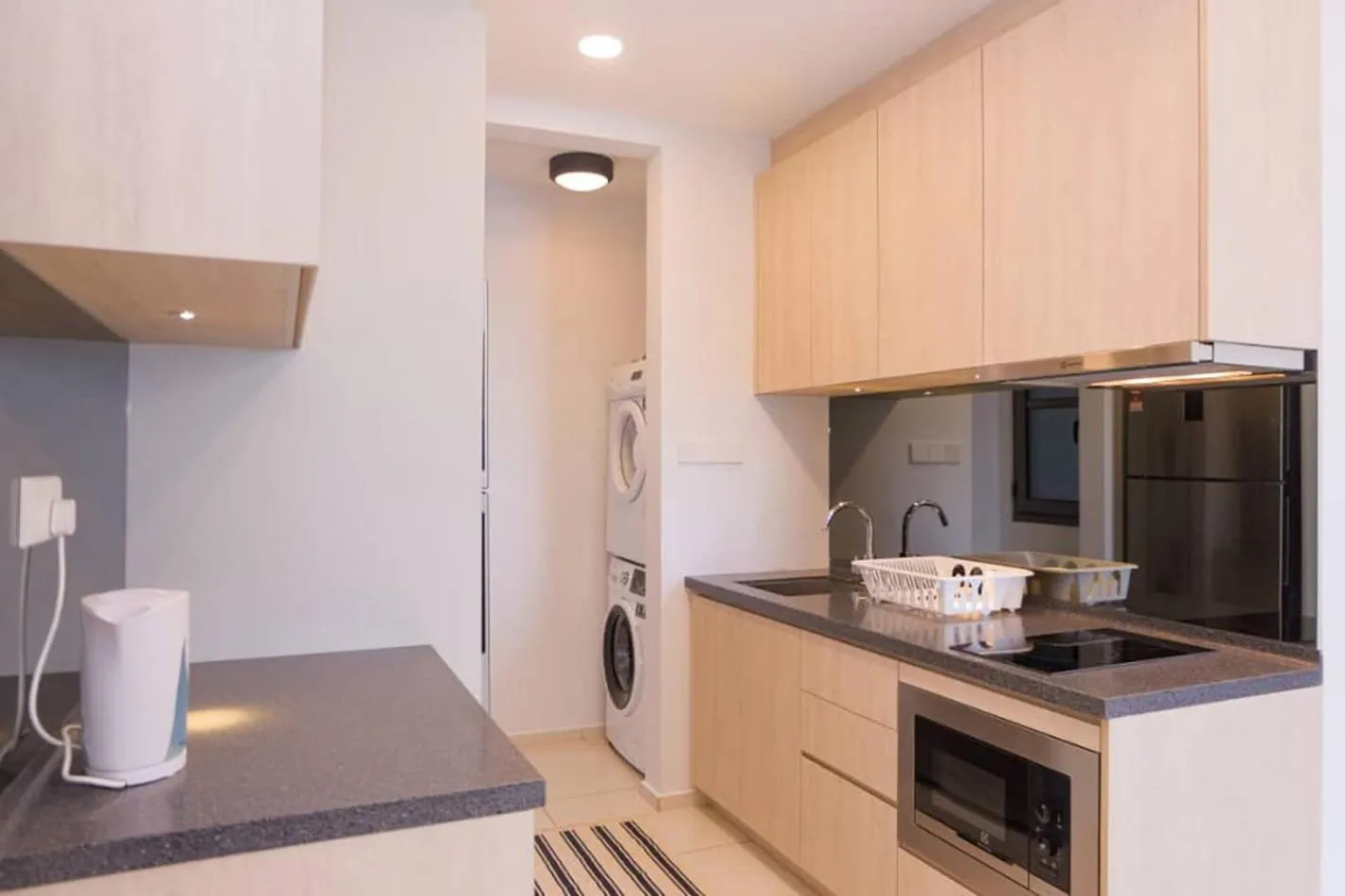 Kitchen or kitchenette in The Robertson Bukit Bintang by Wowhome