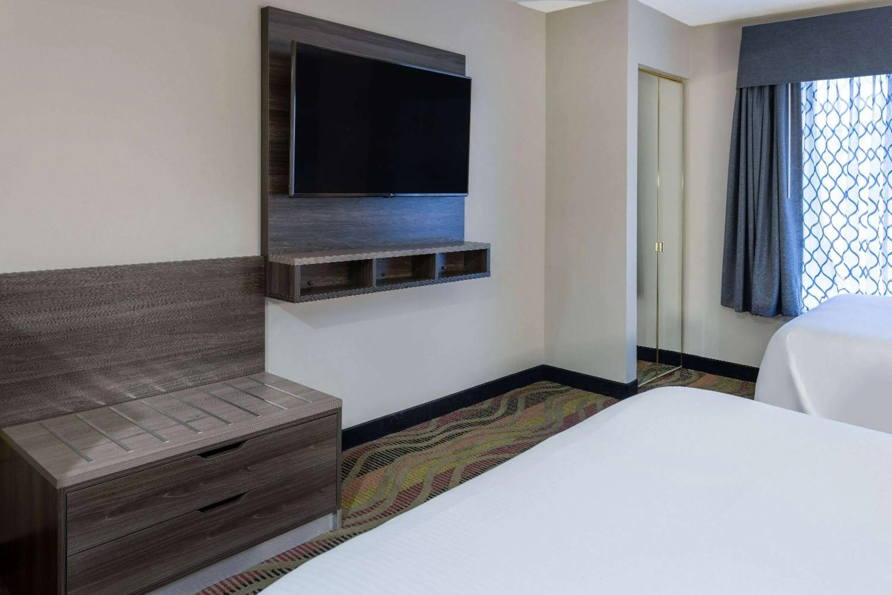 Bed in Baymont by Wyndham Budd Lake