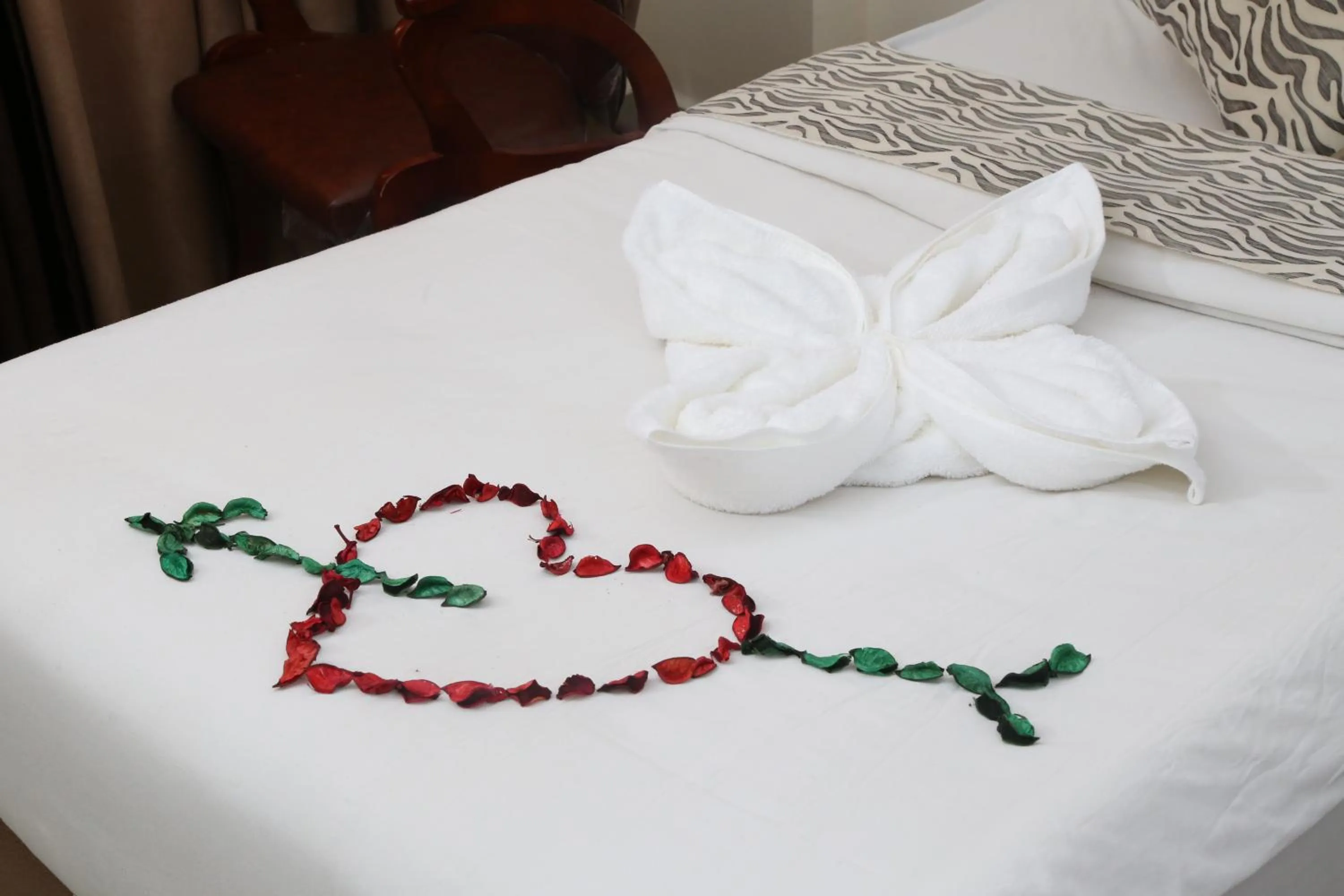 Bed in Grape Village Hotel